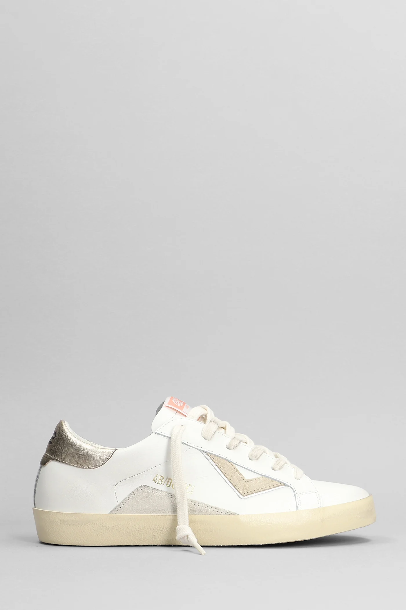 Suprime Sneakers in white leather