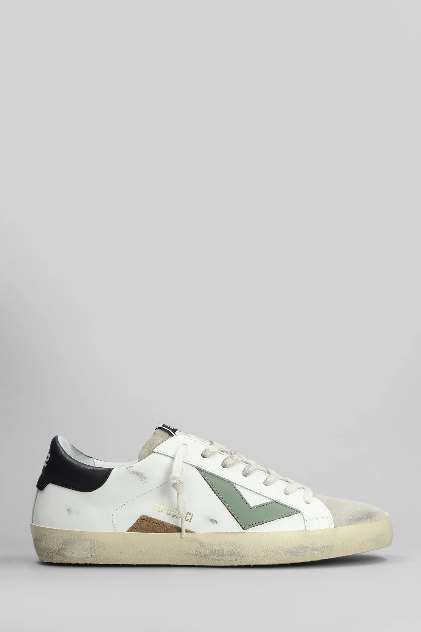 Suprime Sneakers in white suede and leather
