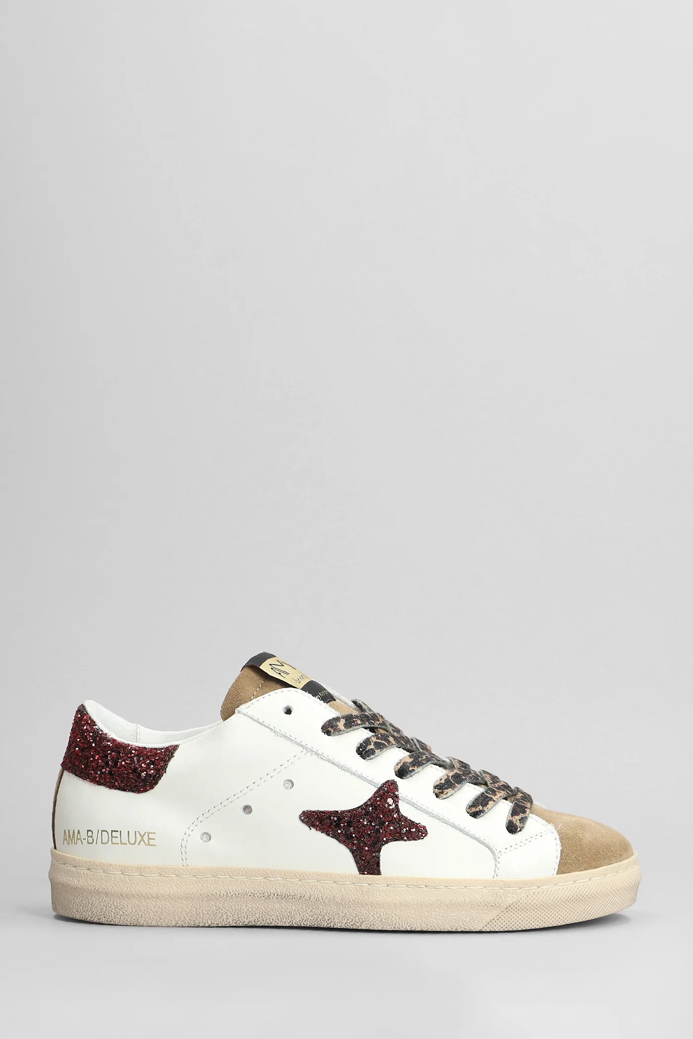 Sneakers in white suede and leather