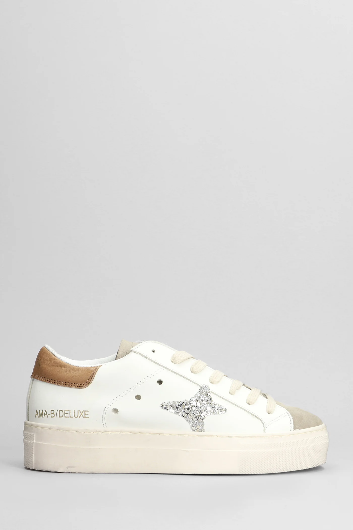 Sneakers in white suede and leather