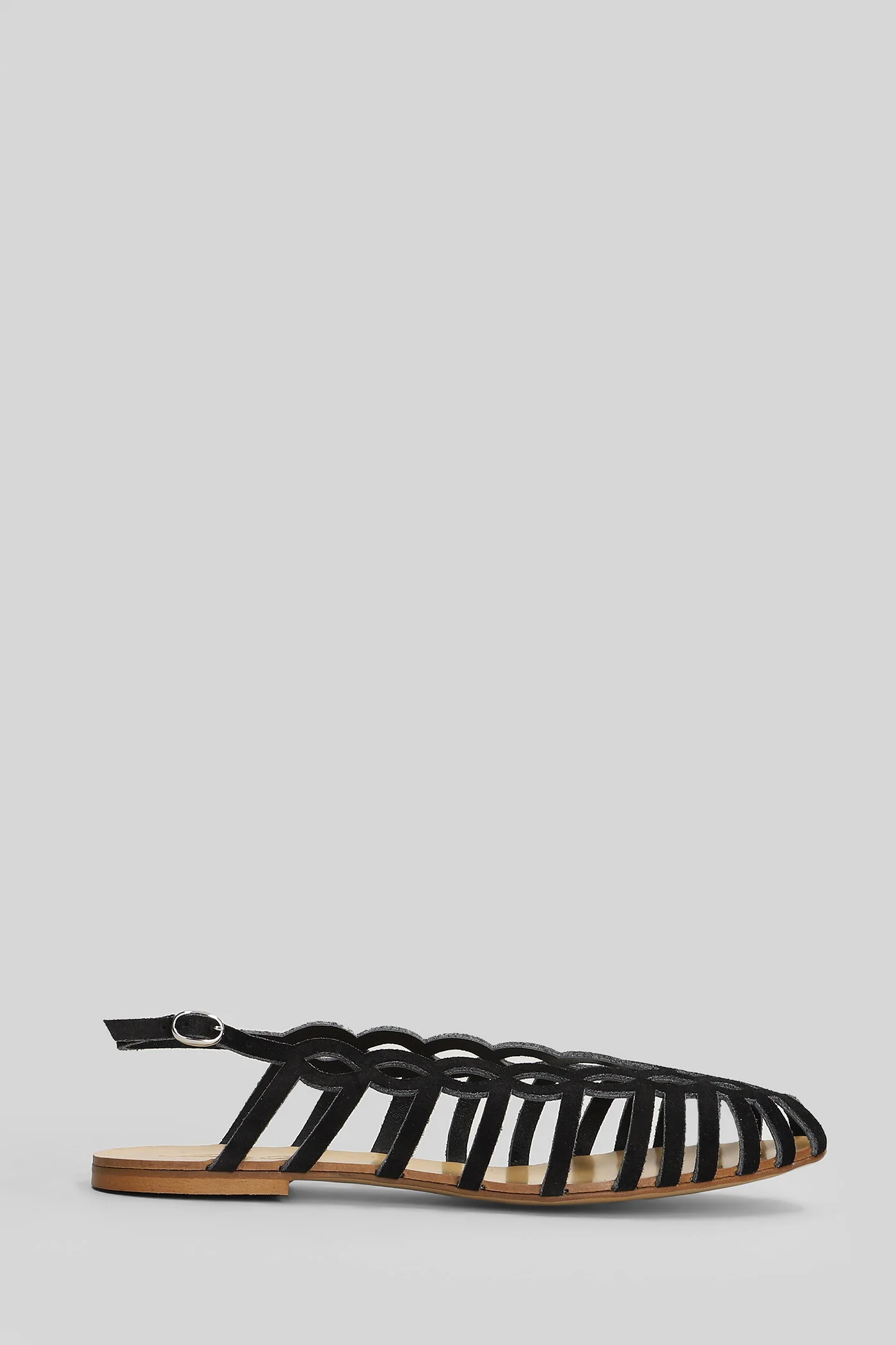 Flat sandal-slipper in black suede