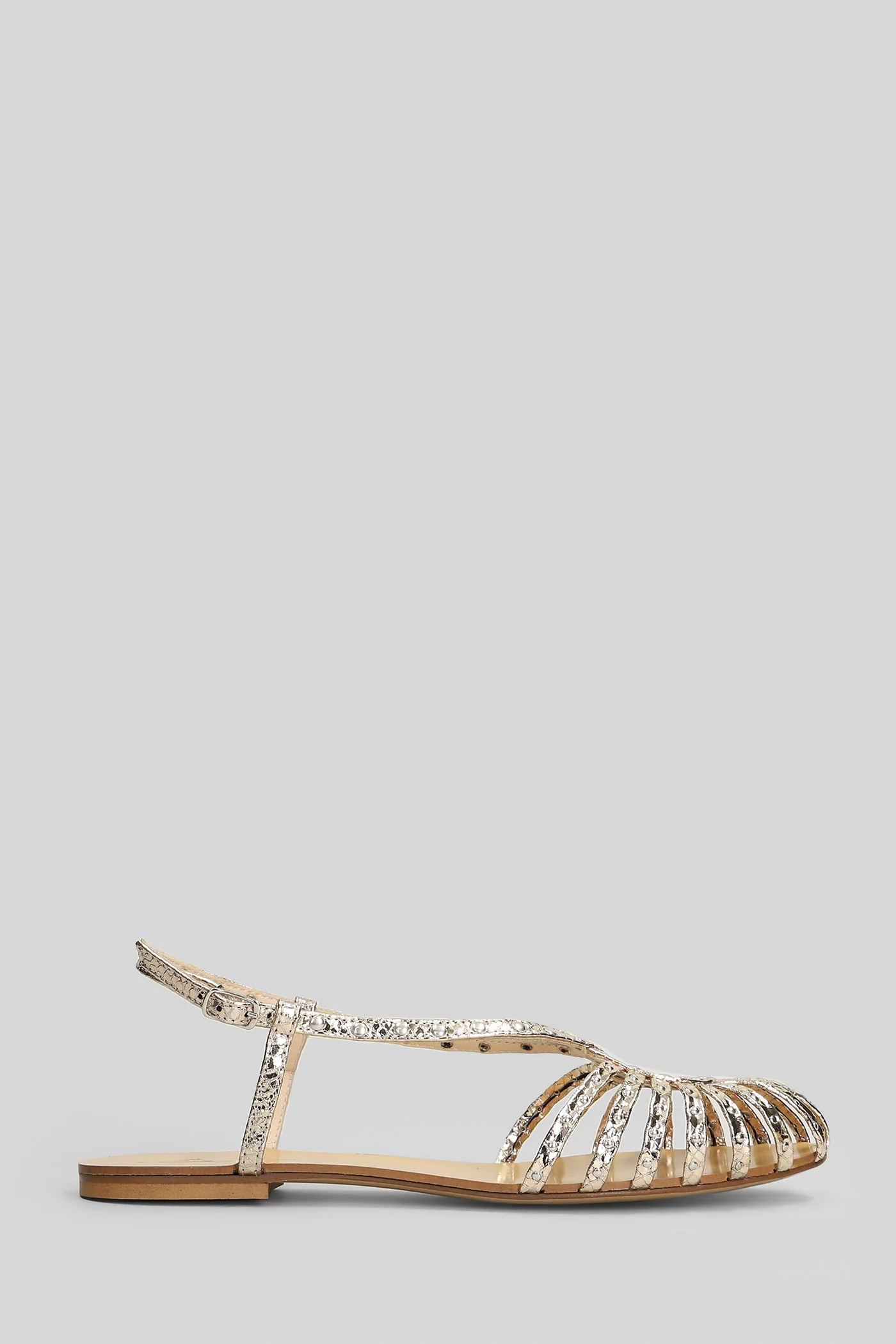 Flat sandal-slipper in platinum leather
