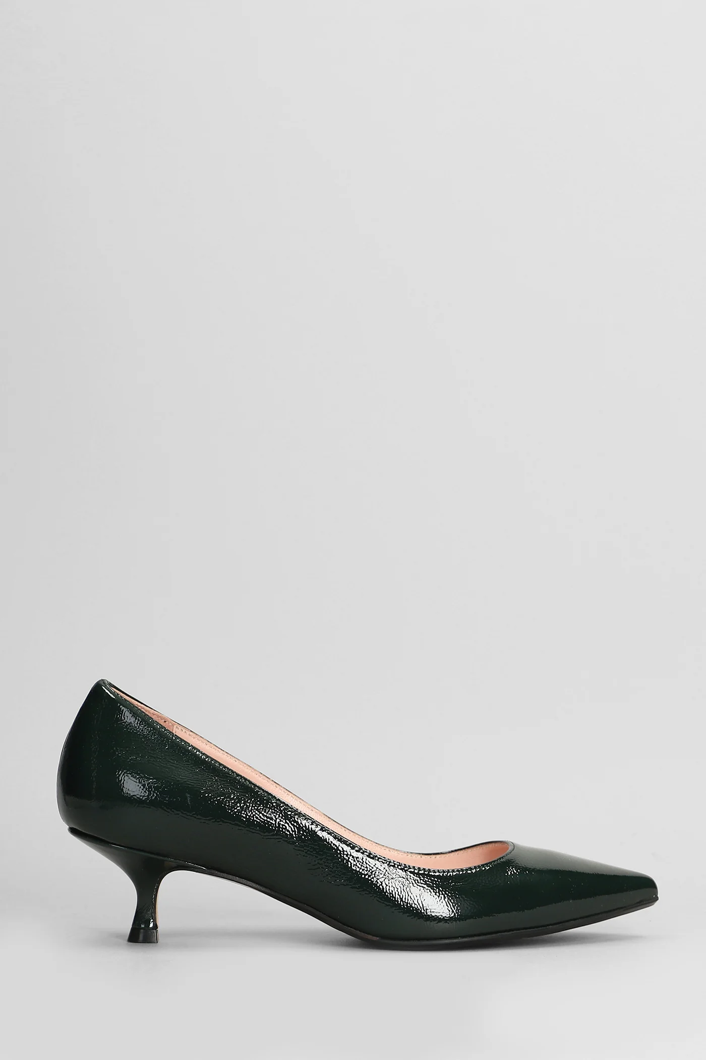Pumps in green leather