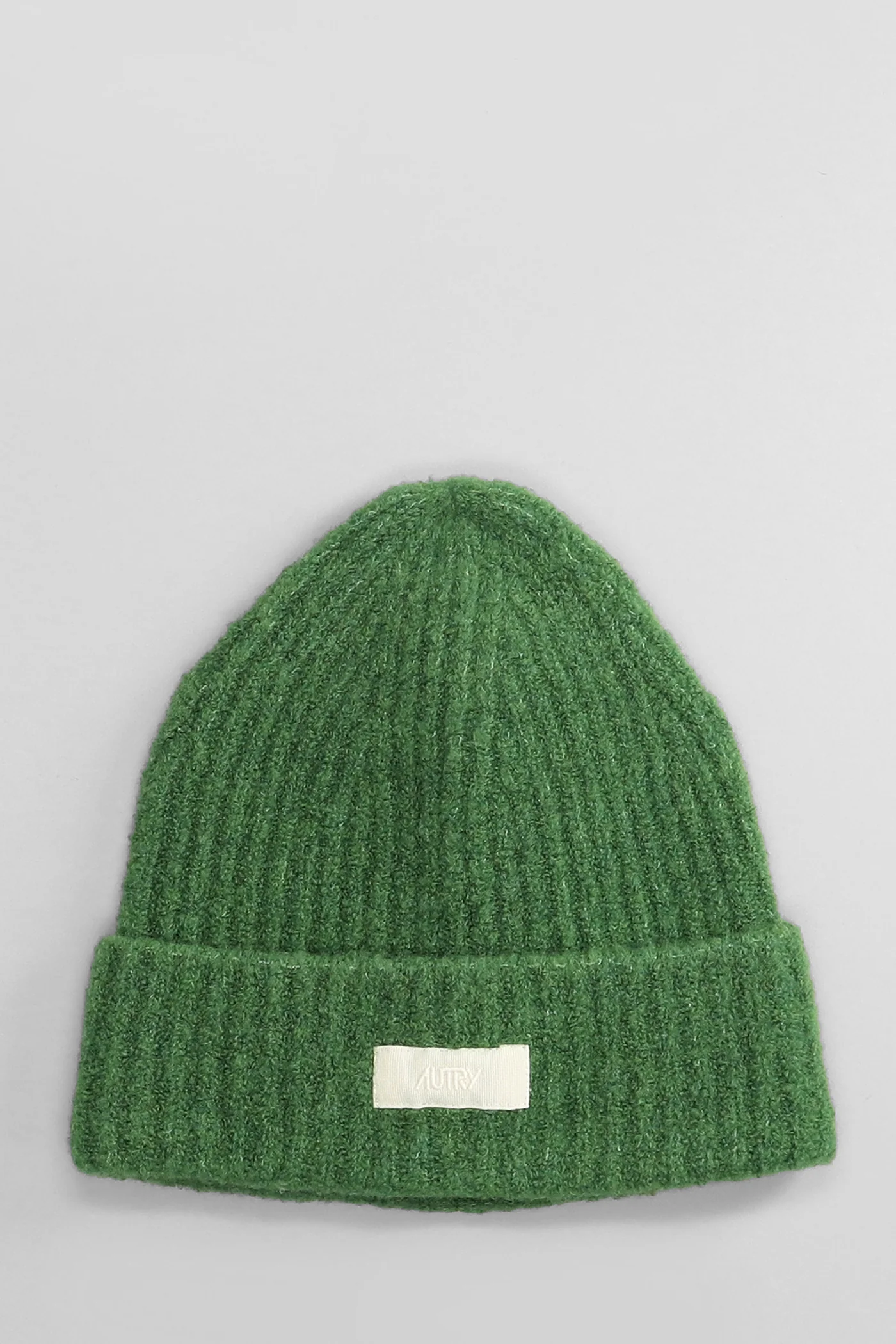 Hats in green wool