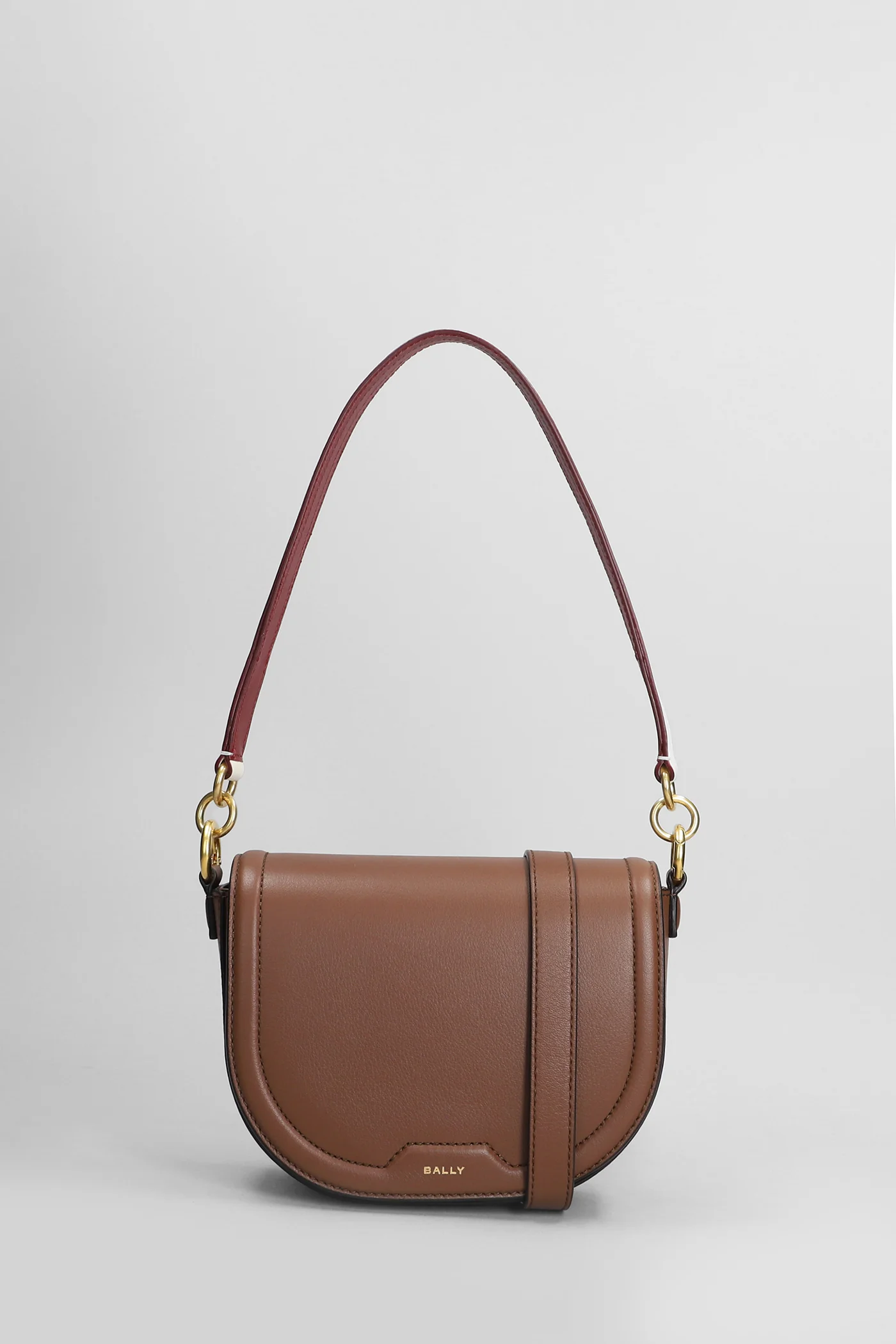 Code flap Shoulder bag in brown leather