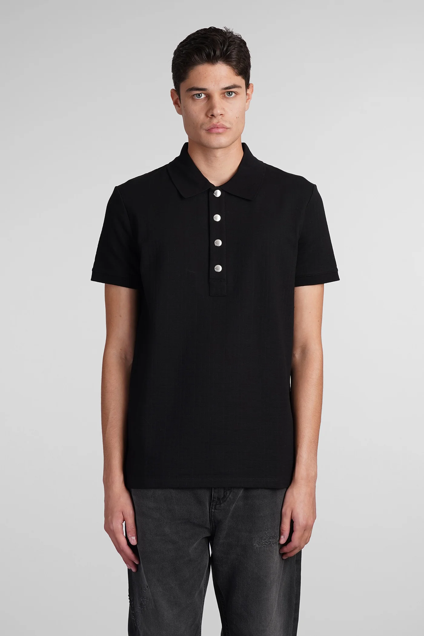 Polo in black cotton