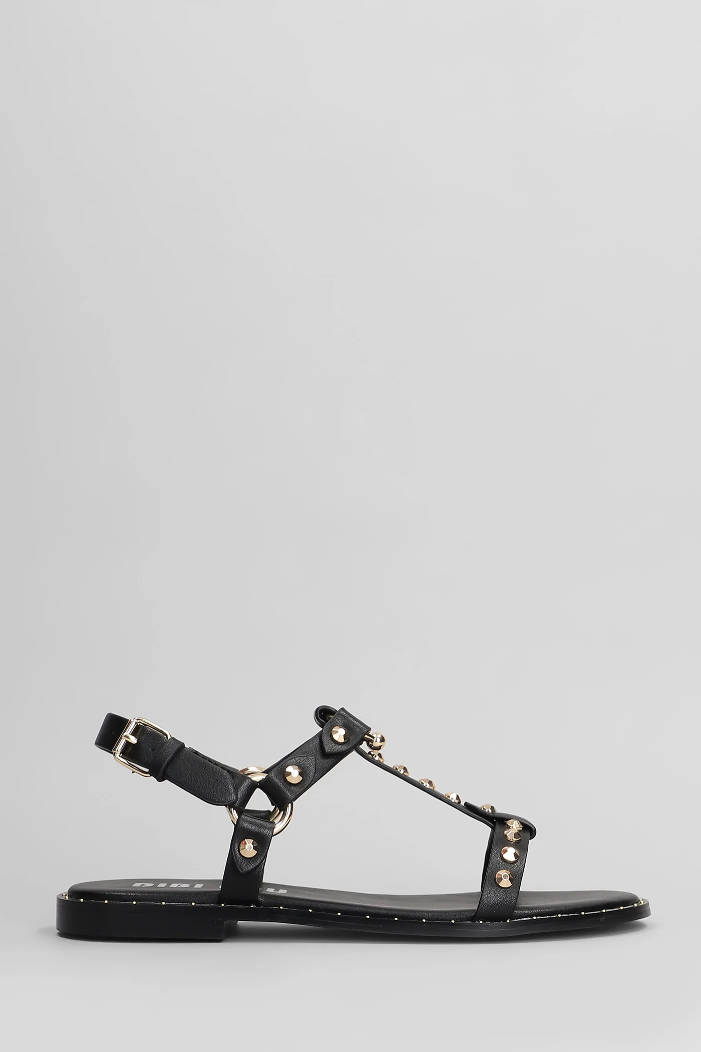 Dunia Flats in black leather
