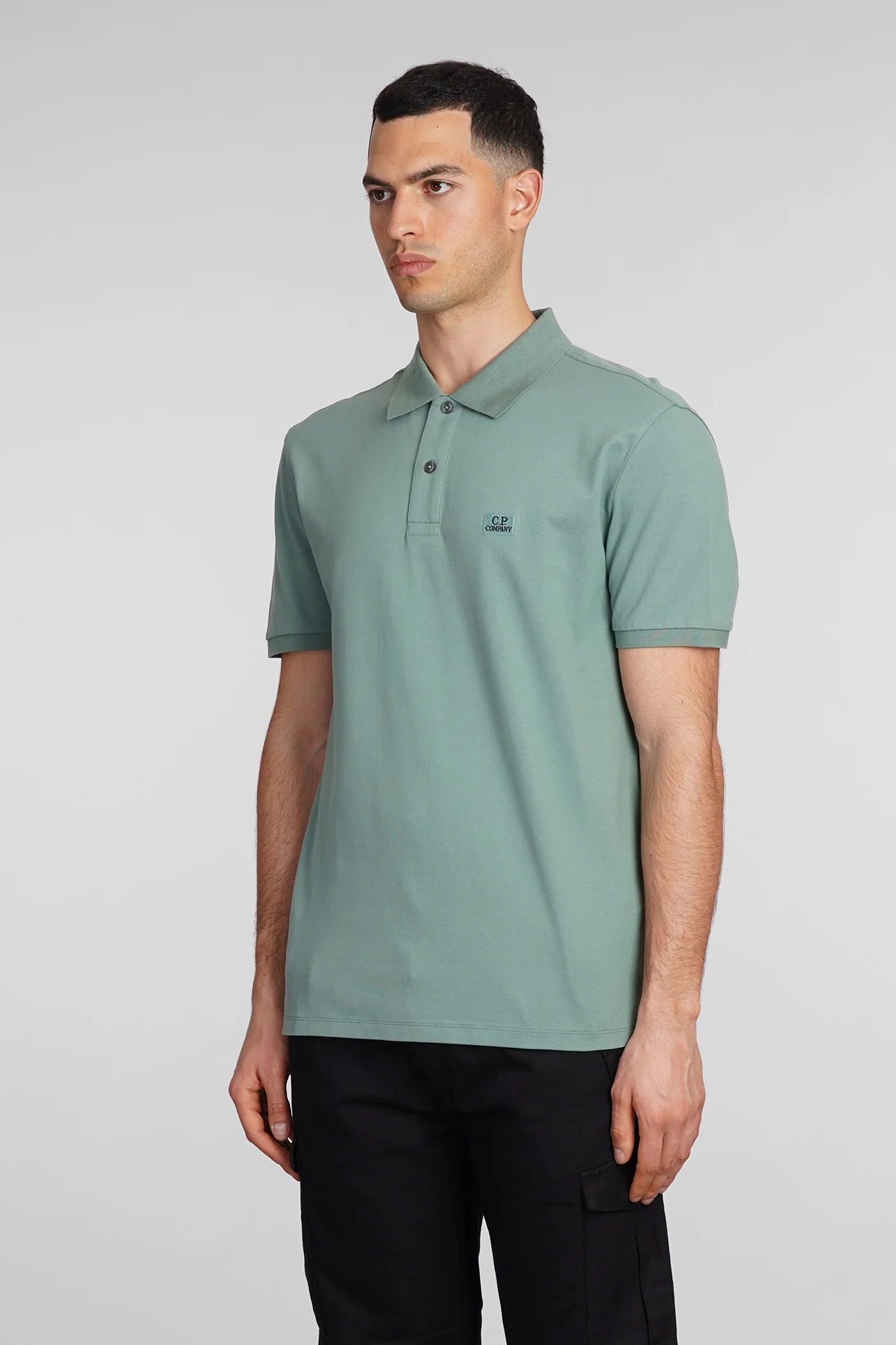 Polo in green cotton - Image 4