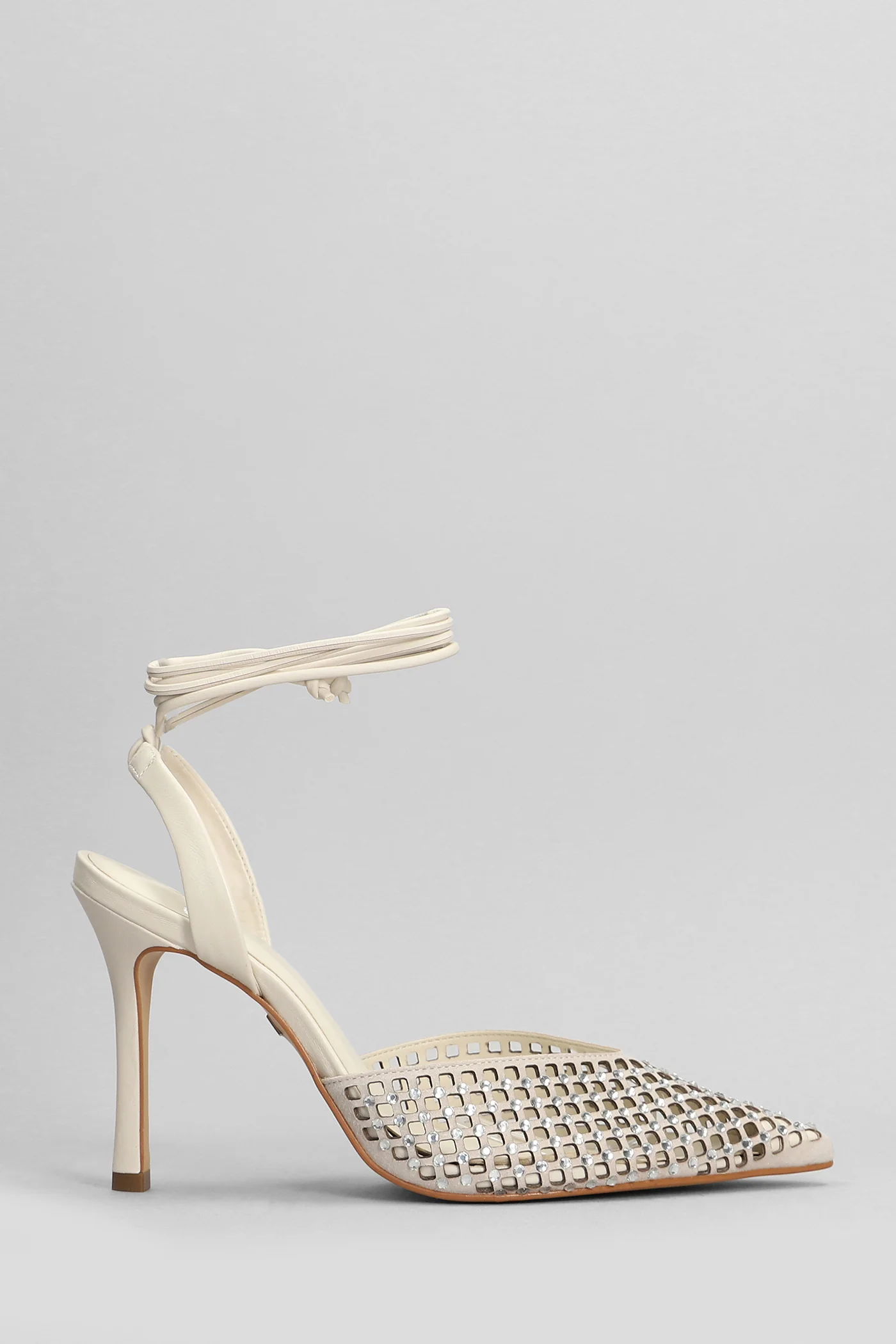Pumps in beige suede and leather