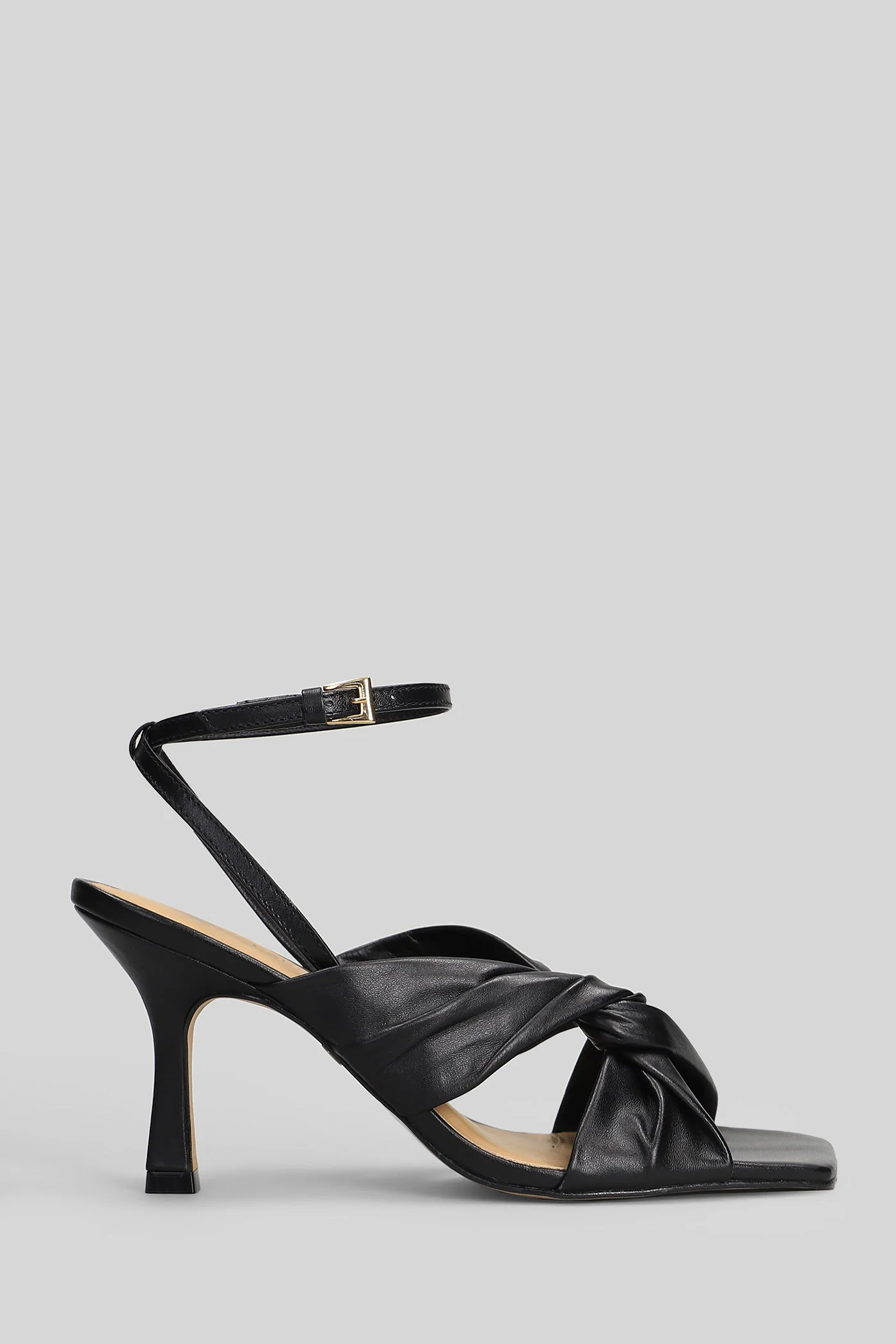 Sandals in black leather