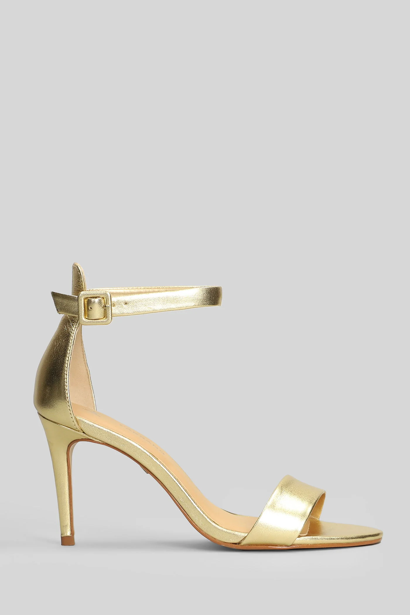 Sandals in gold leather