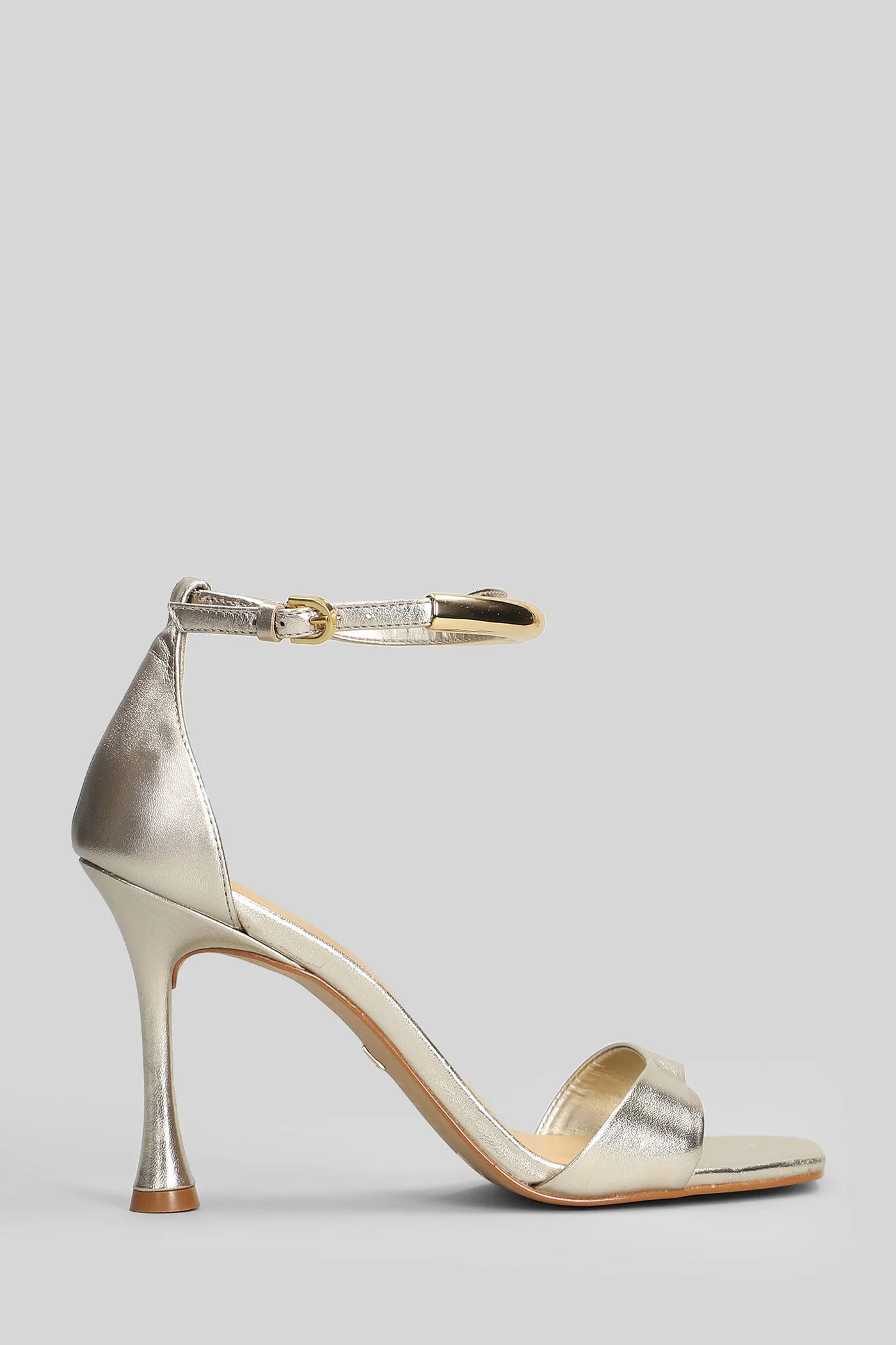Sandals in platinum leather