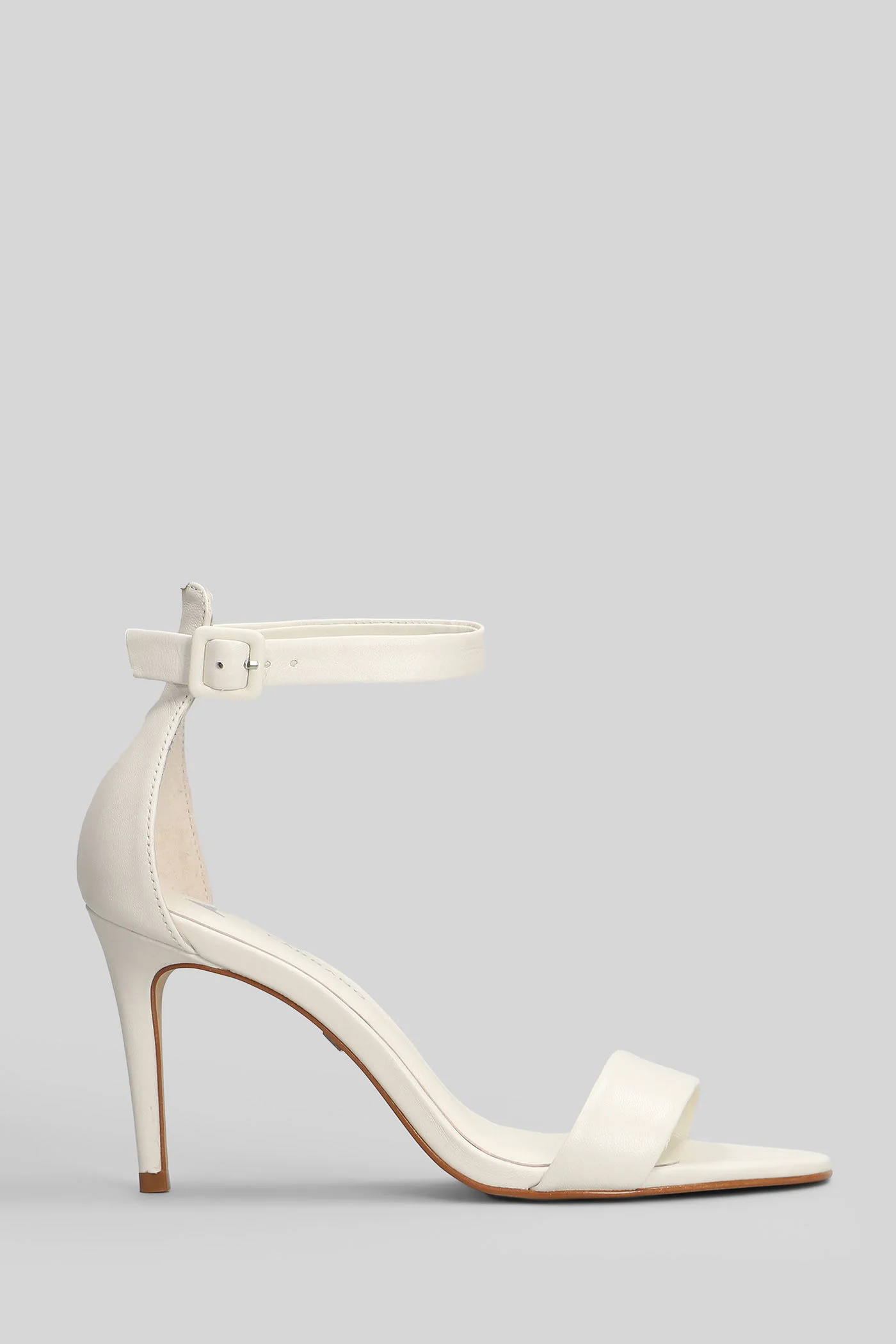 Sandals in white leather