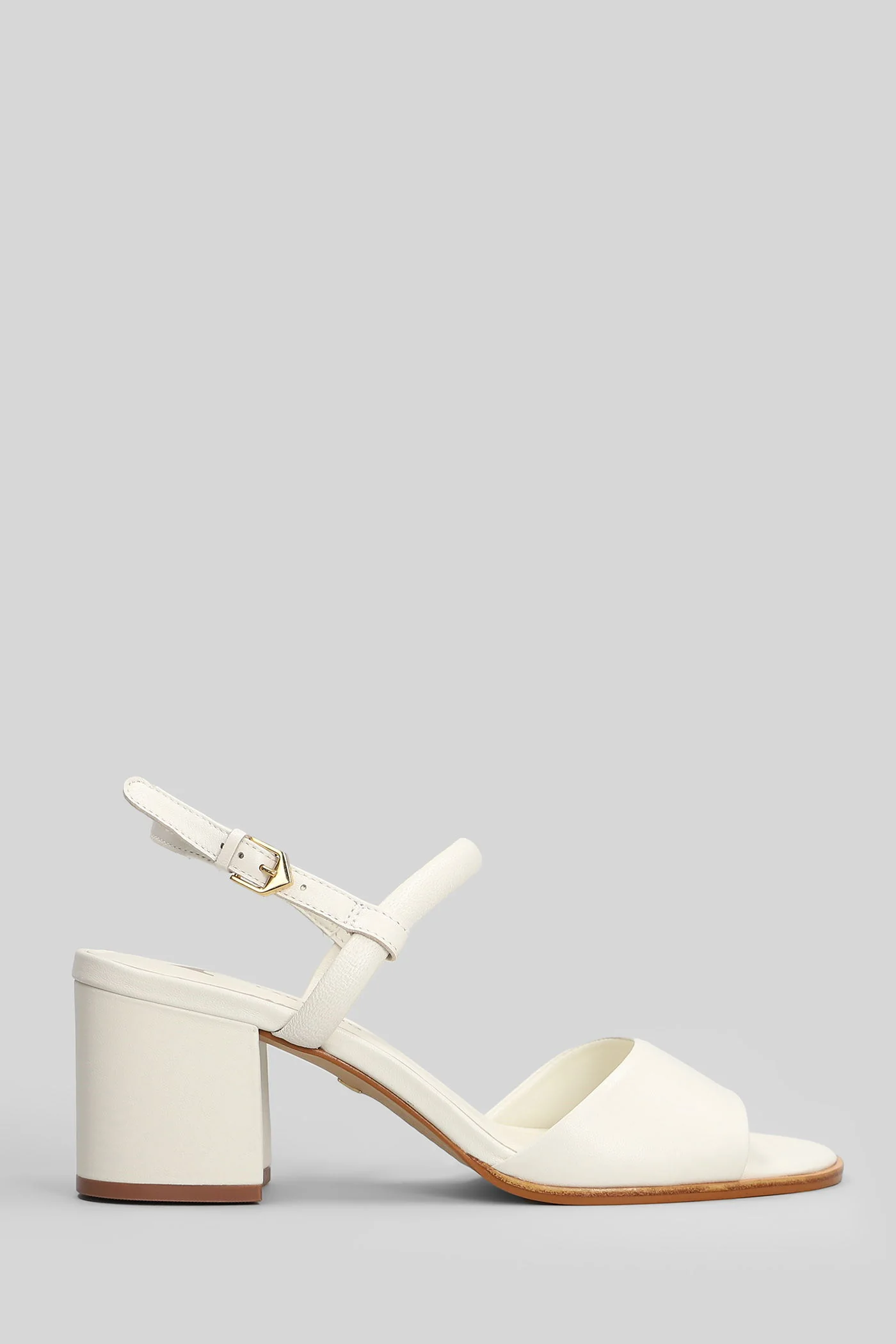 Sandals in white leather