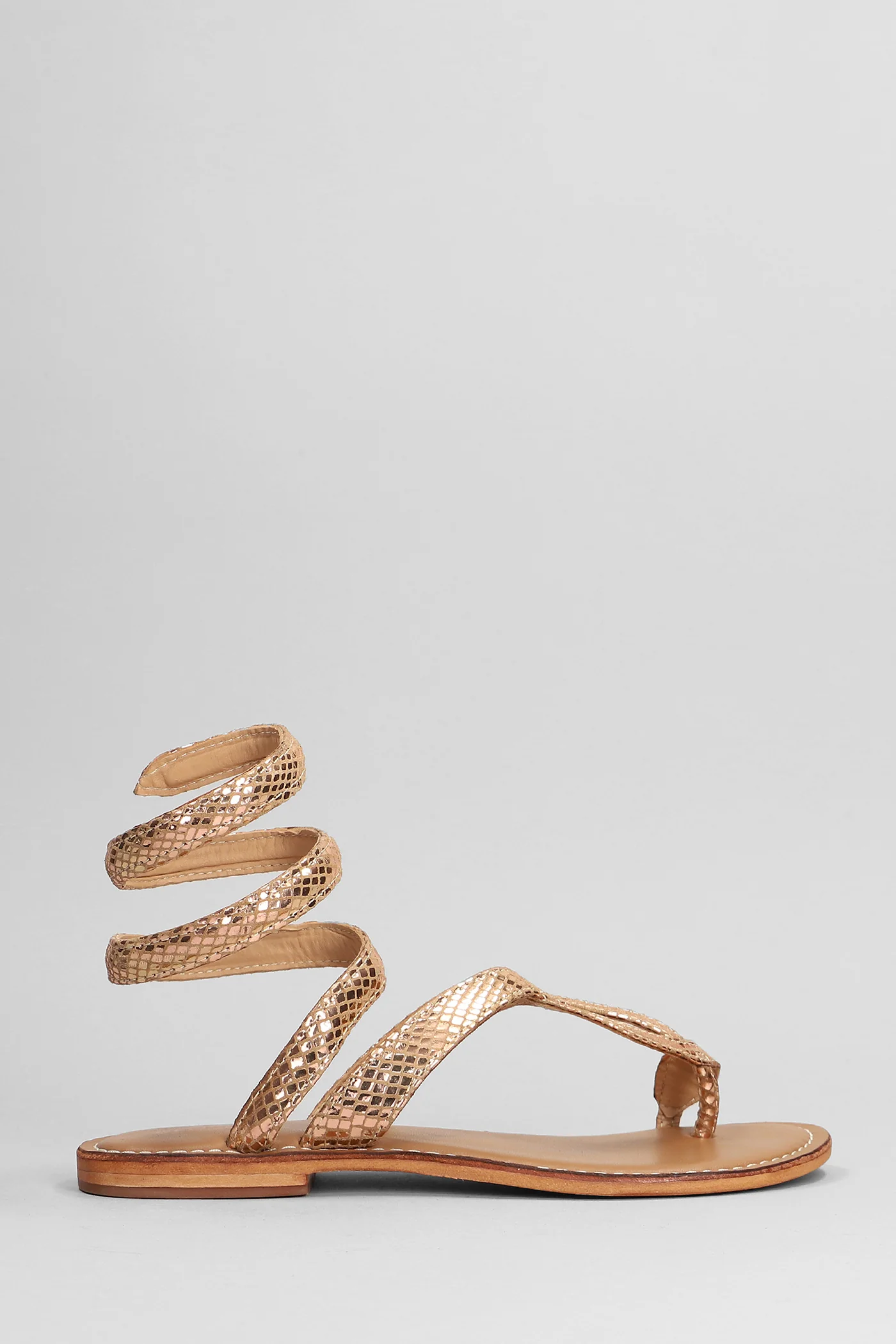 Flats in copper leather