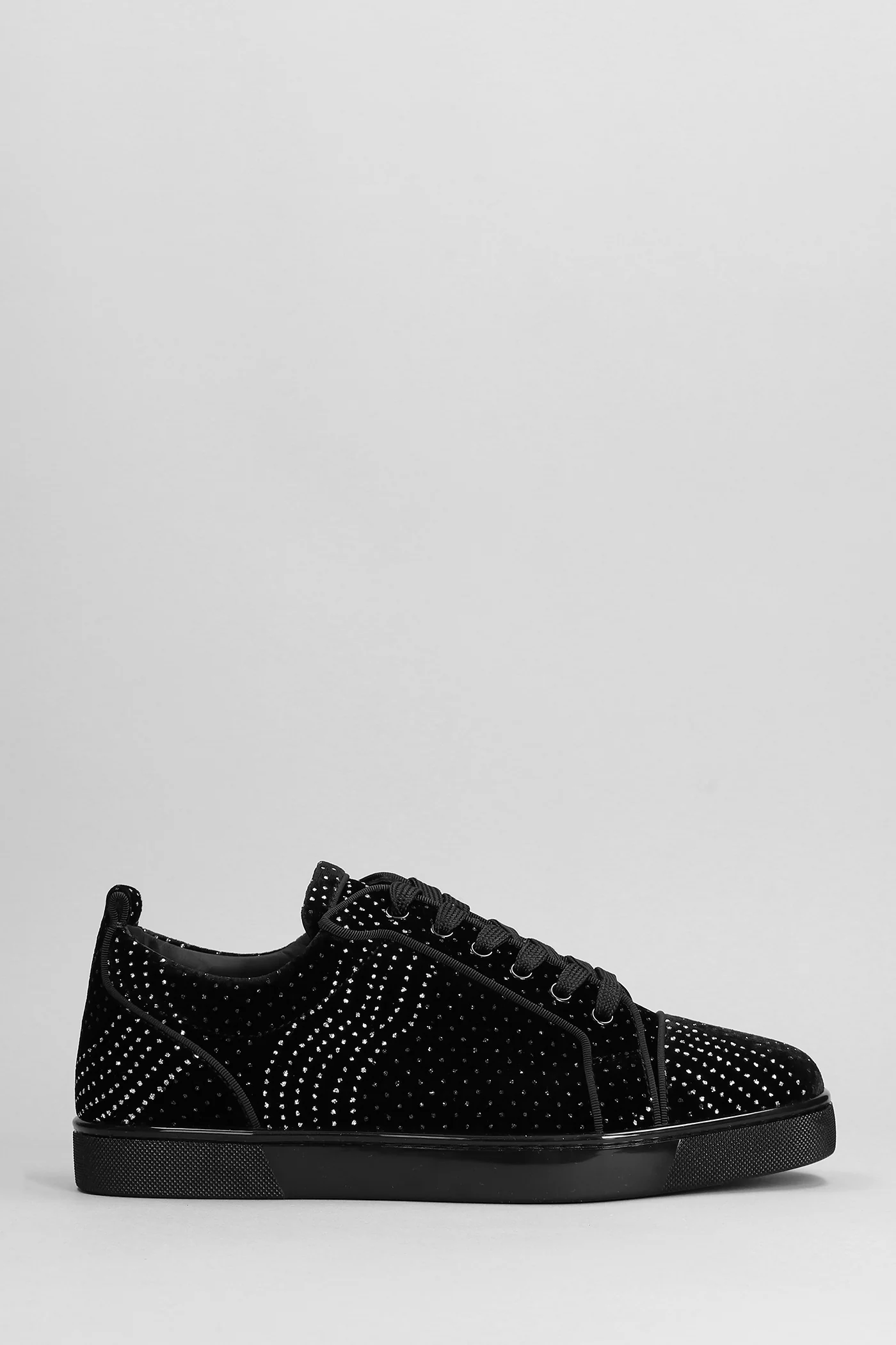 Sneakers in black velvet