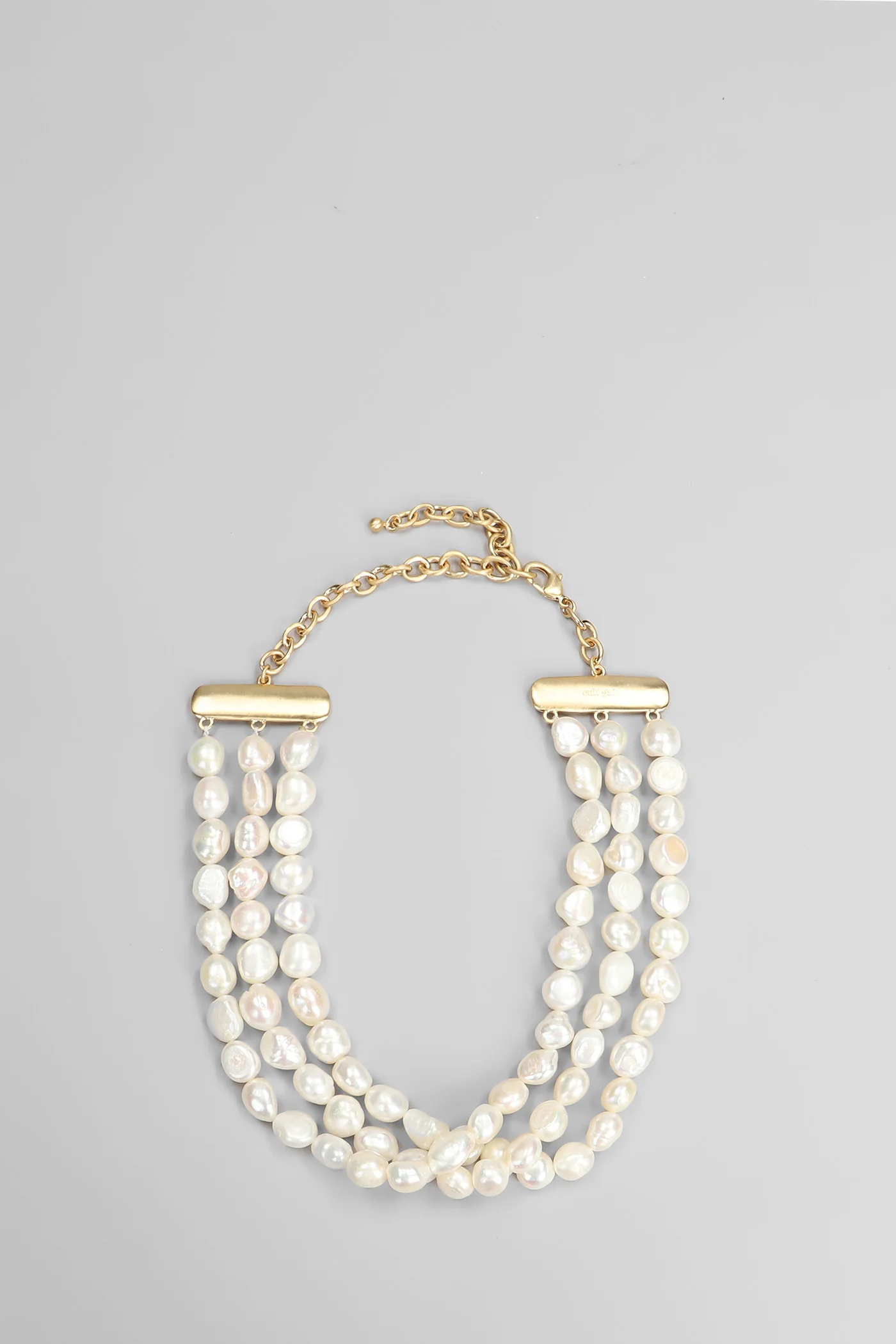 Nora  in beige brass