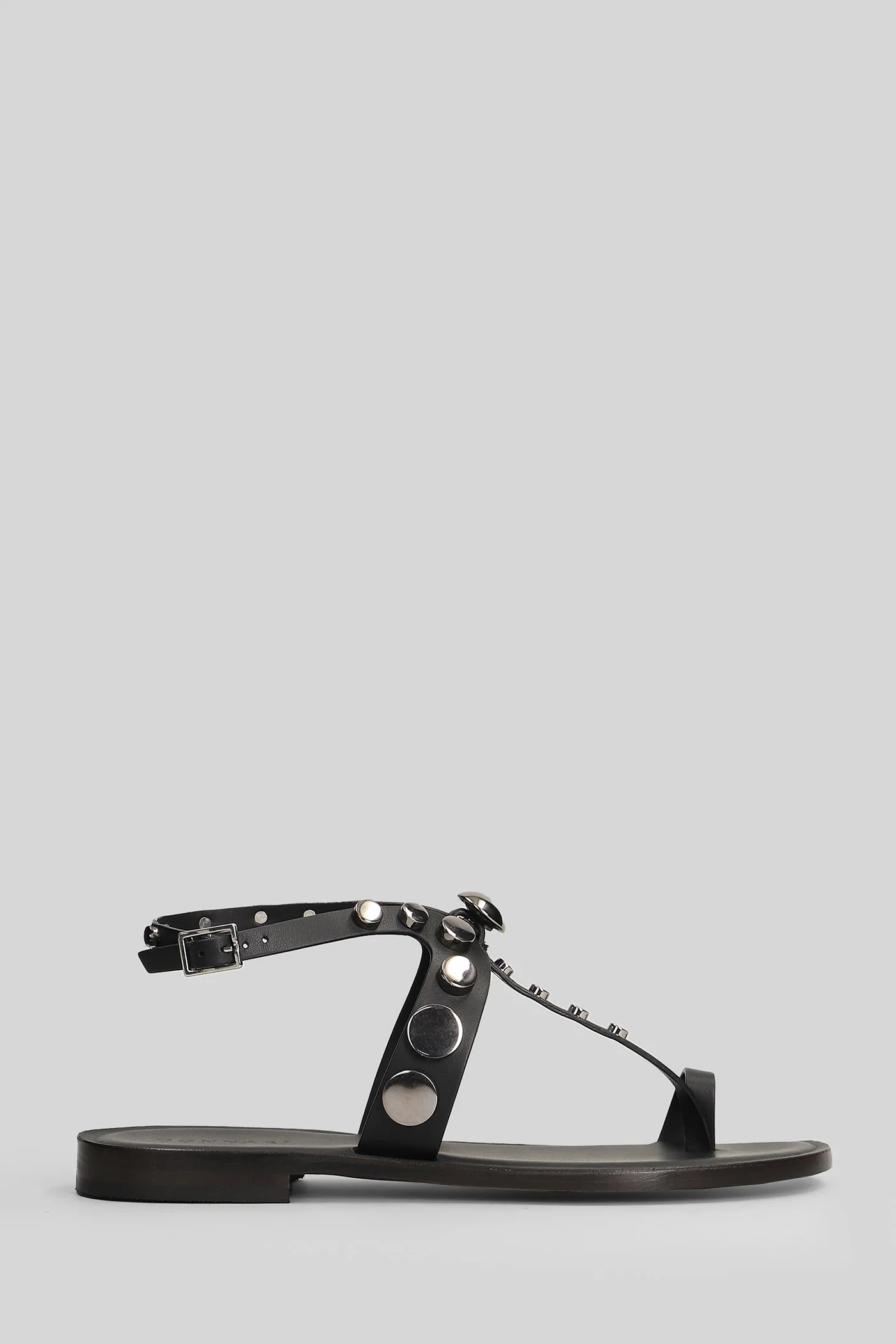 Flat sandal-slipper in black leather