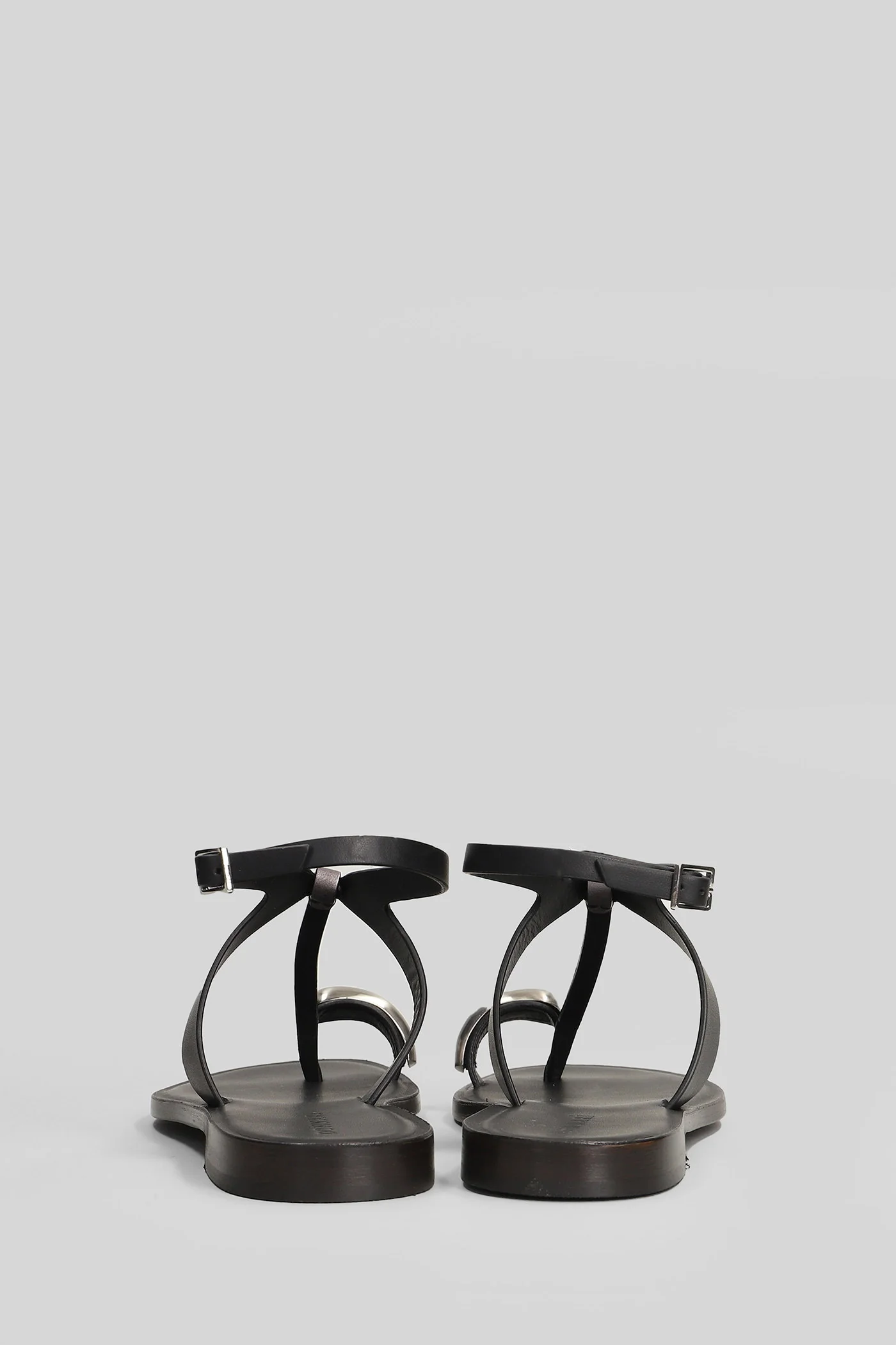 Flat sandal-slipper in black leather and fabric - Image 4