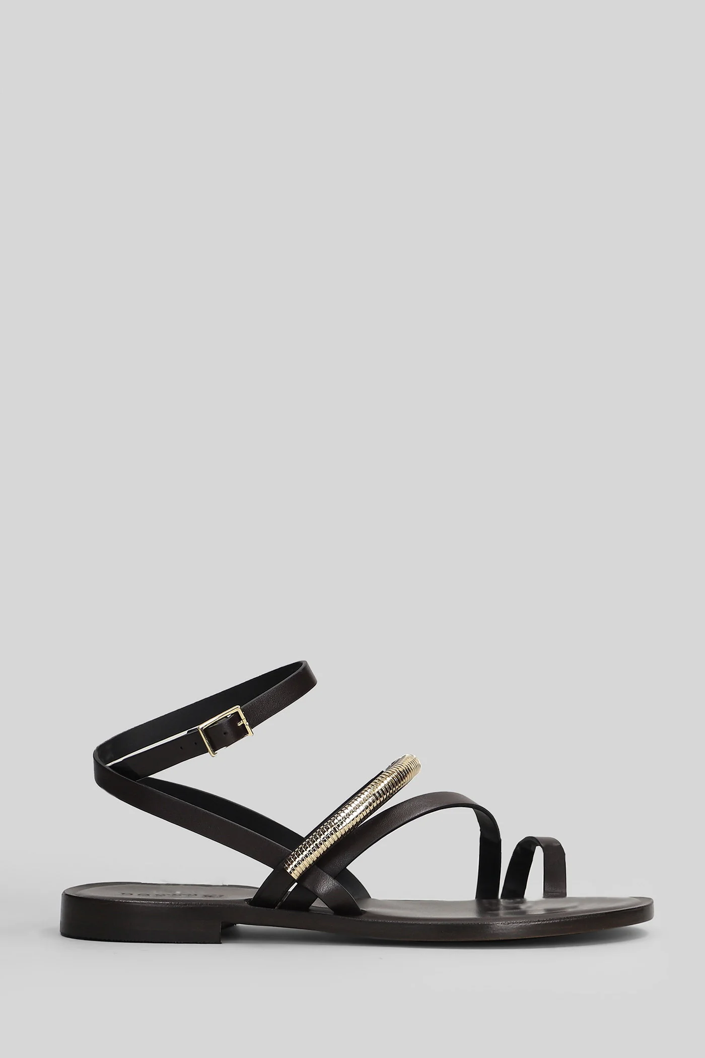 Flat sandal-slipper in brown leather