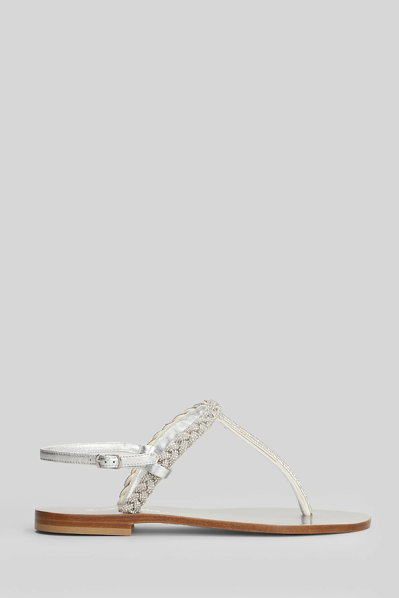 Flat sandal-slipper in silver leather