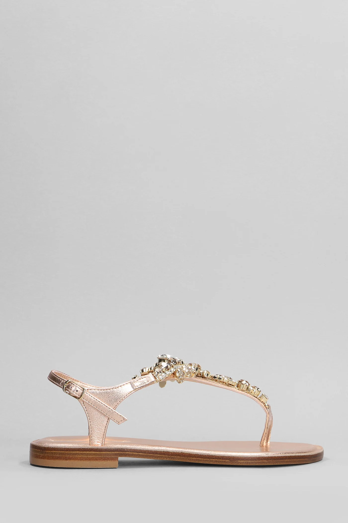 Flats in copper leather