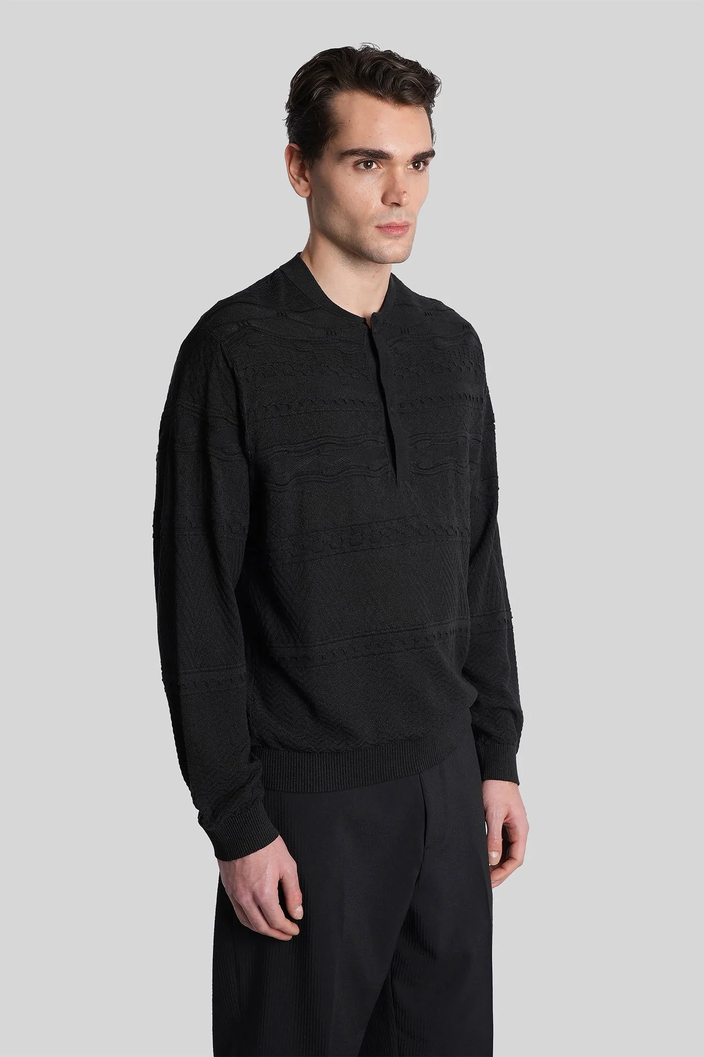 Polo in black wool and polyester - Image 4
