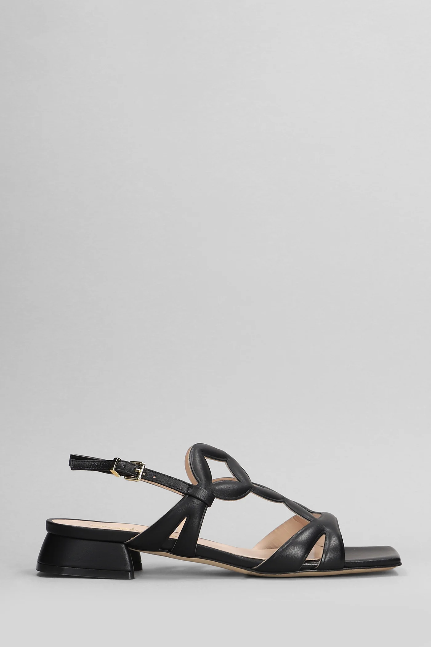 Sandals in black leather