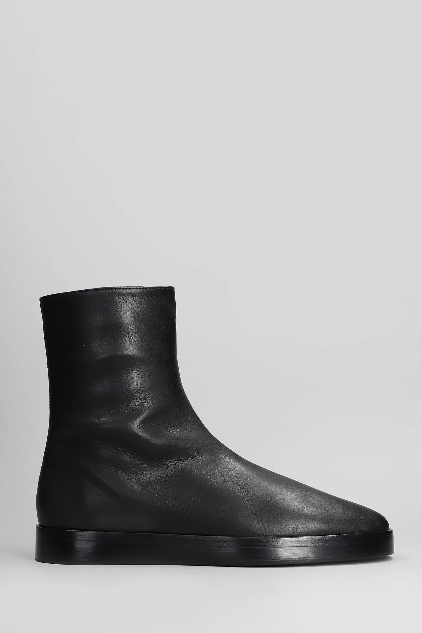 Mule high Ankle boots in black leather