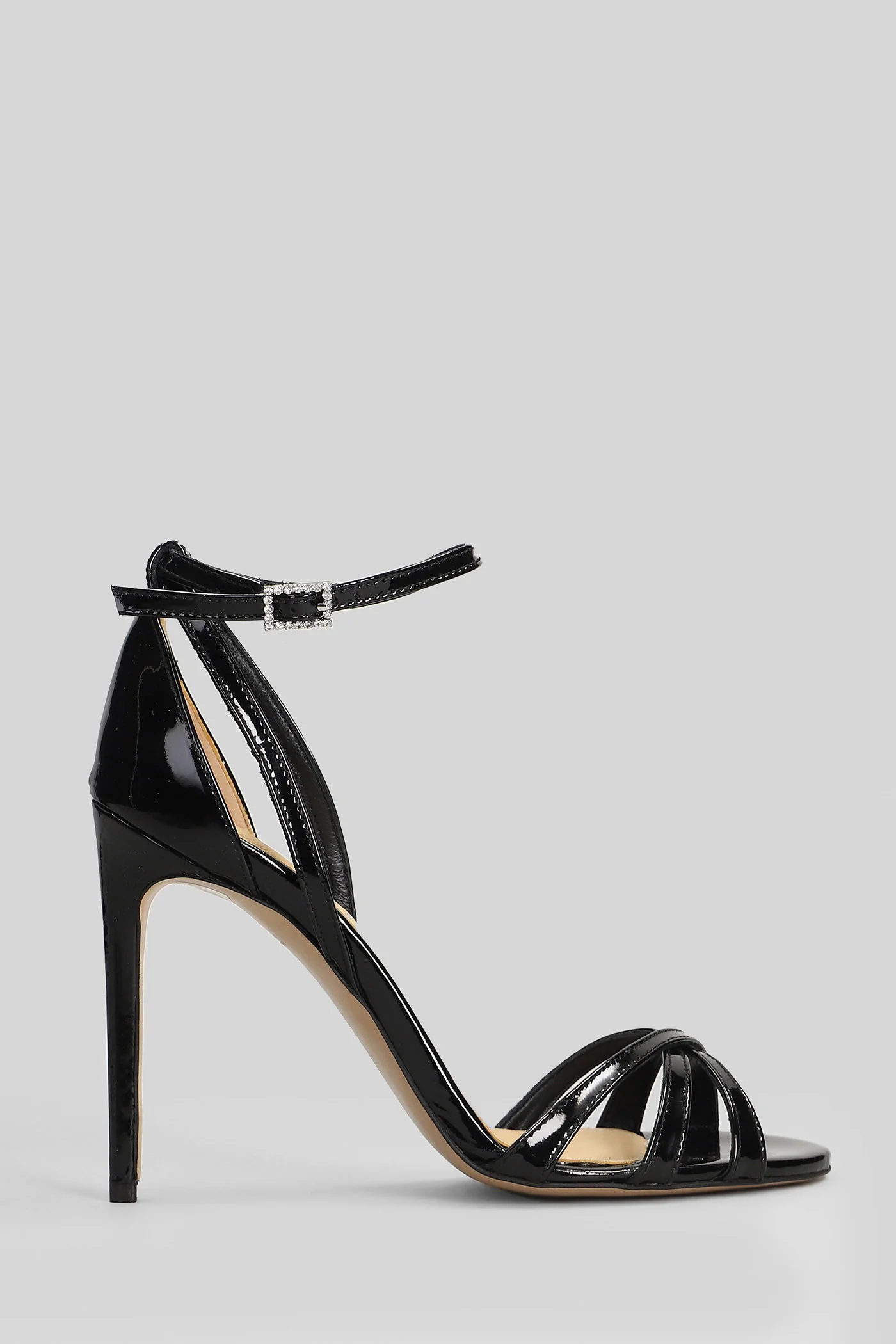 Sandals in black patent leather