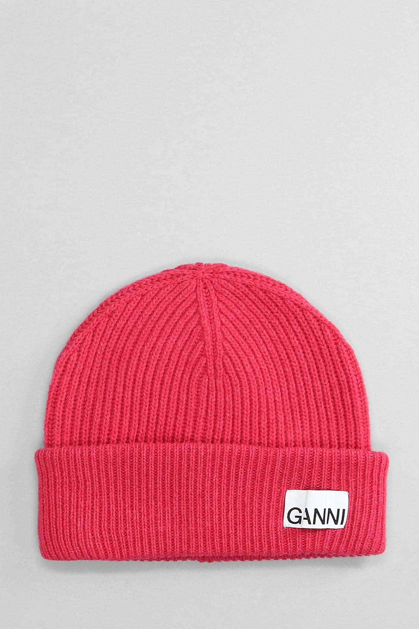 Hats in fuxia wool