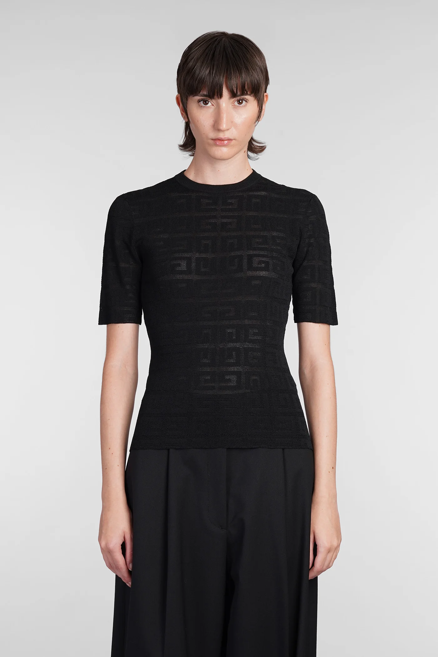 Topwear in black viscose