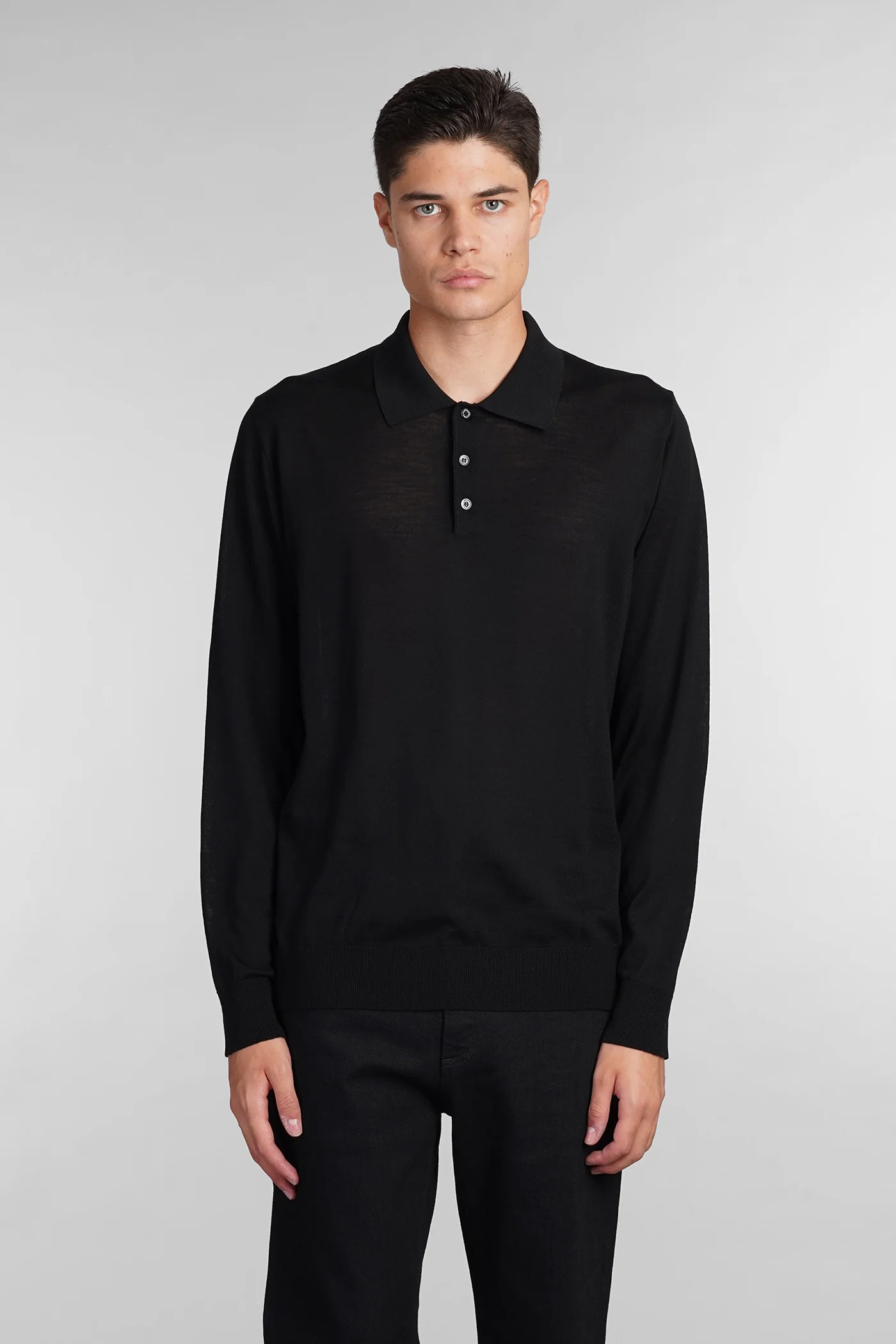 Polo in black wool