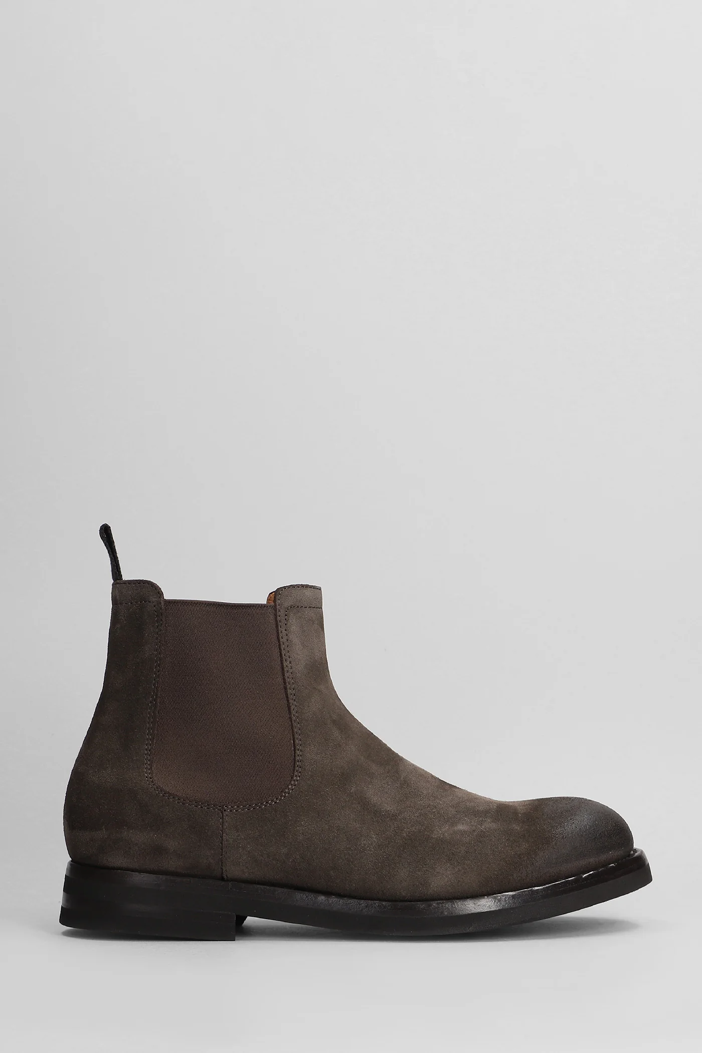 Combat boots in brown suede