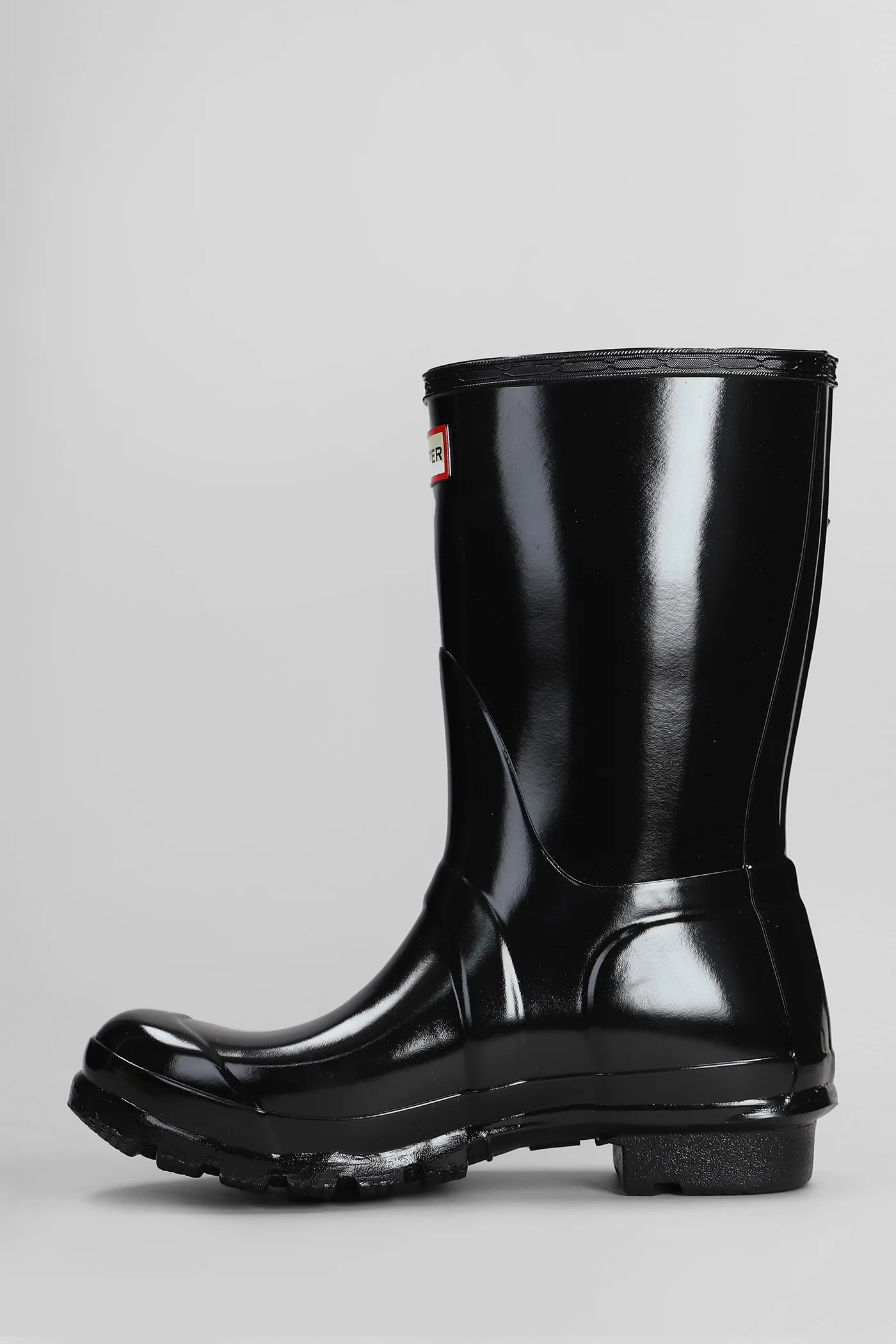 Original short gloss low heels boots in black rubber/plasic - Image 3