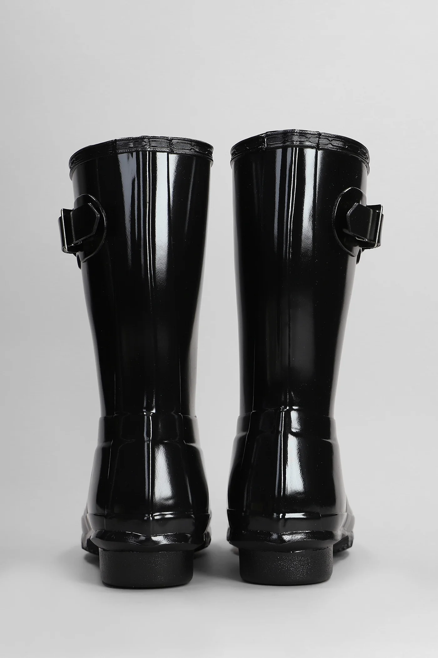 Original short gloss low heels boots in black rubber/plasic - Image 4