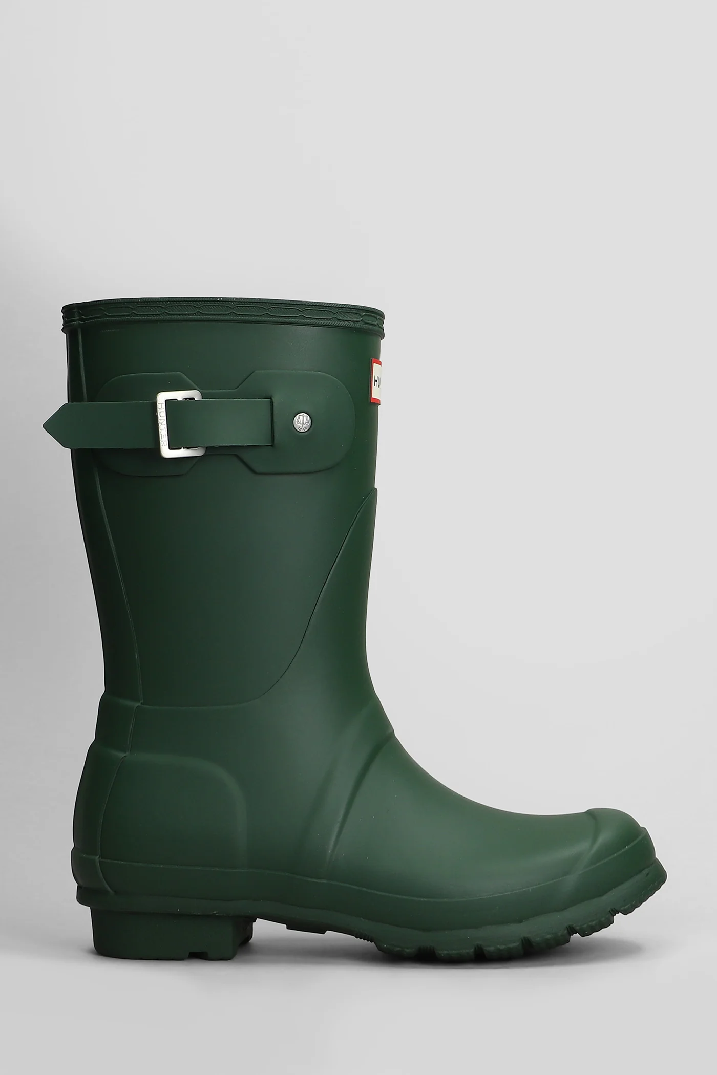 Original short low heels boots in green rubber/plasic