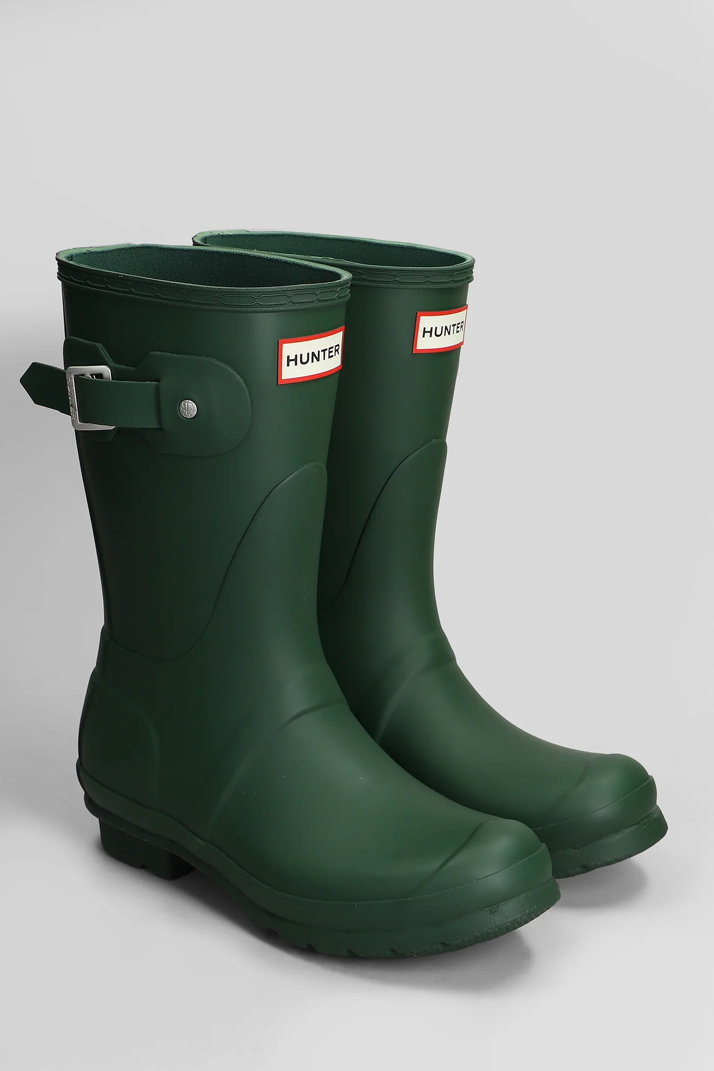 Original short low heels boots in green rubber/plasic - Image 2