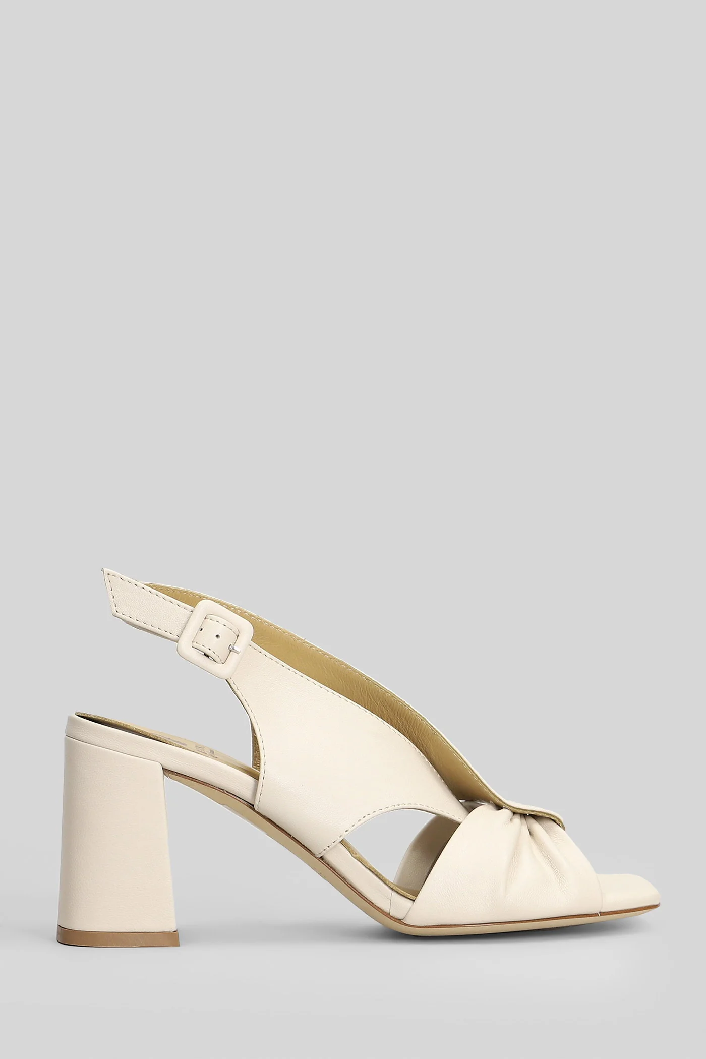 Sandals in white leather