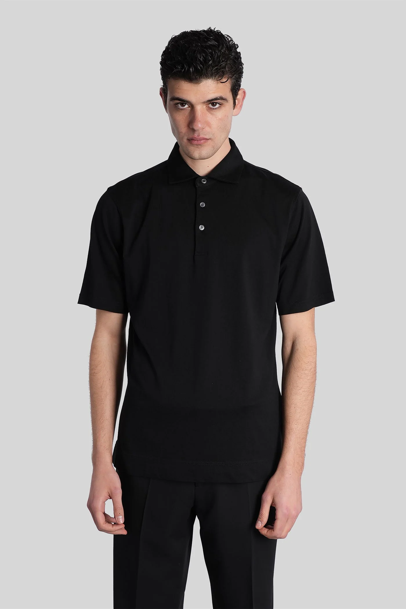Polo in black cotton