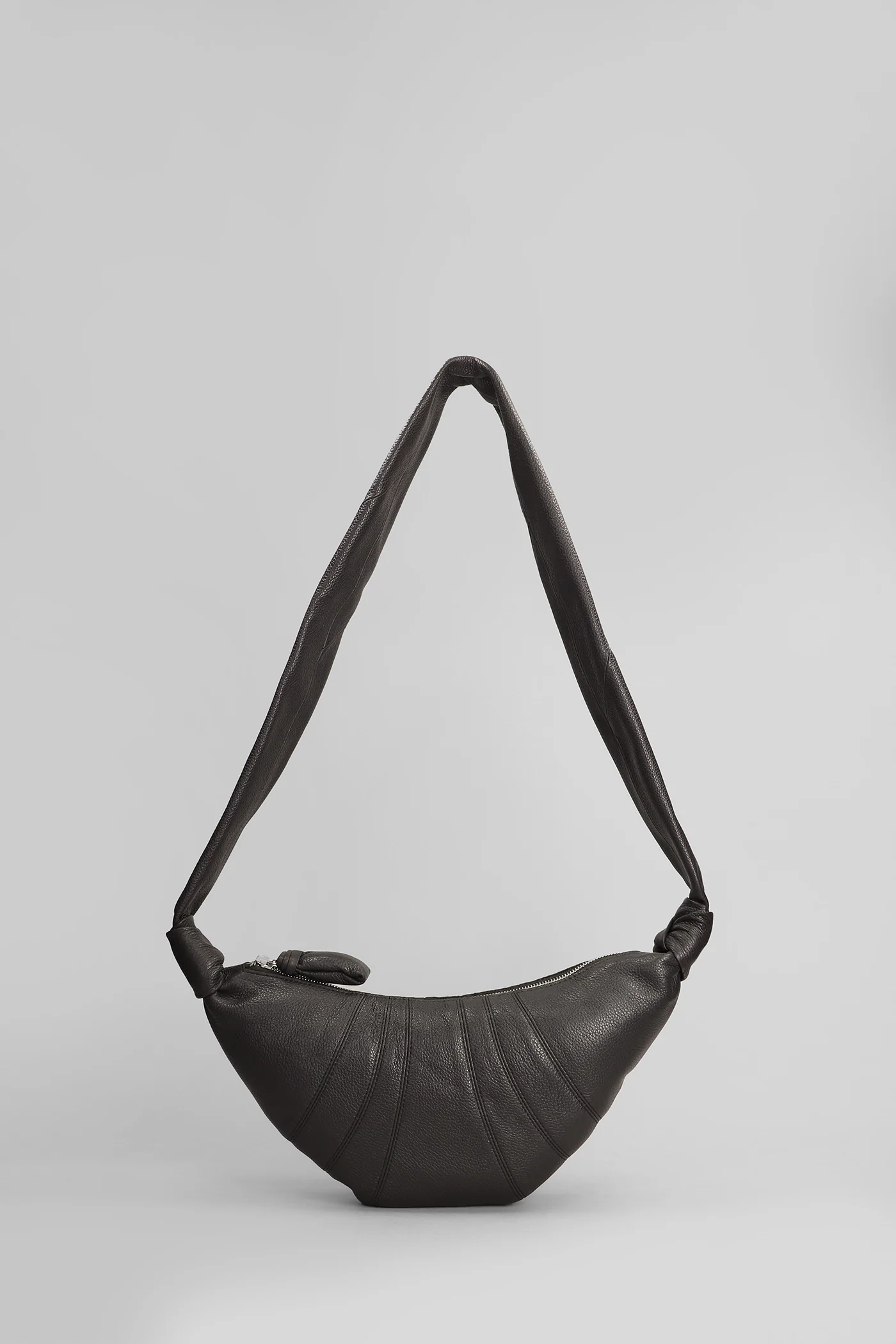 Small croissant Shoulder bag in brown leather