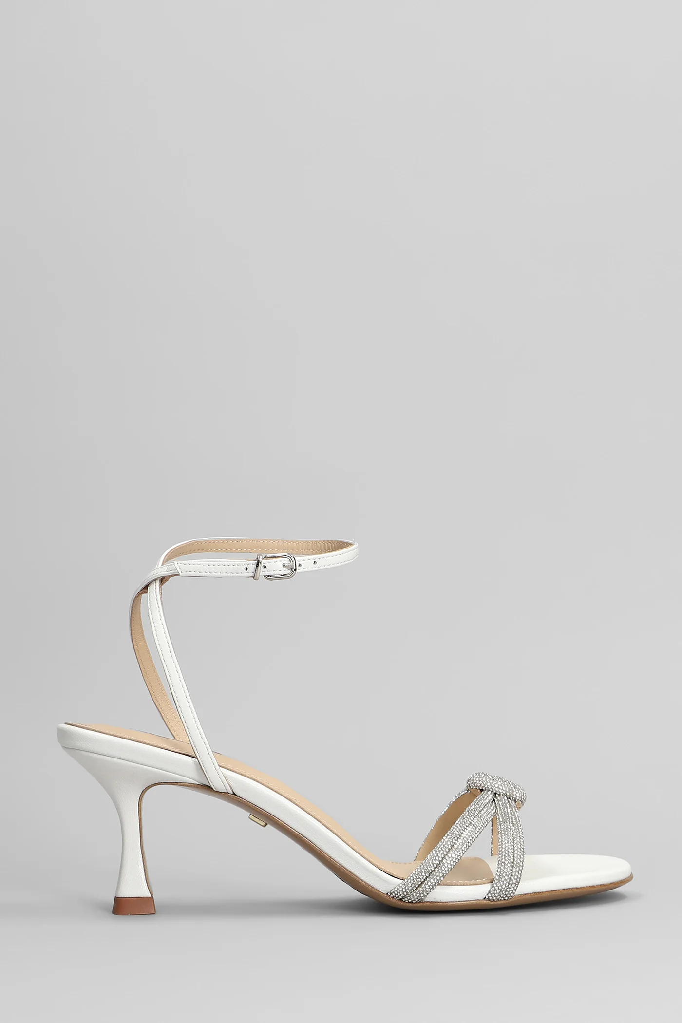 Sandals in white leather