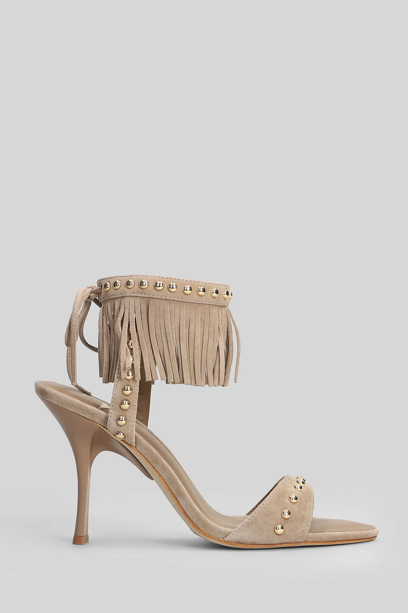 Sandals in beige suede