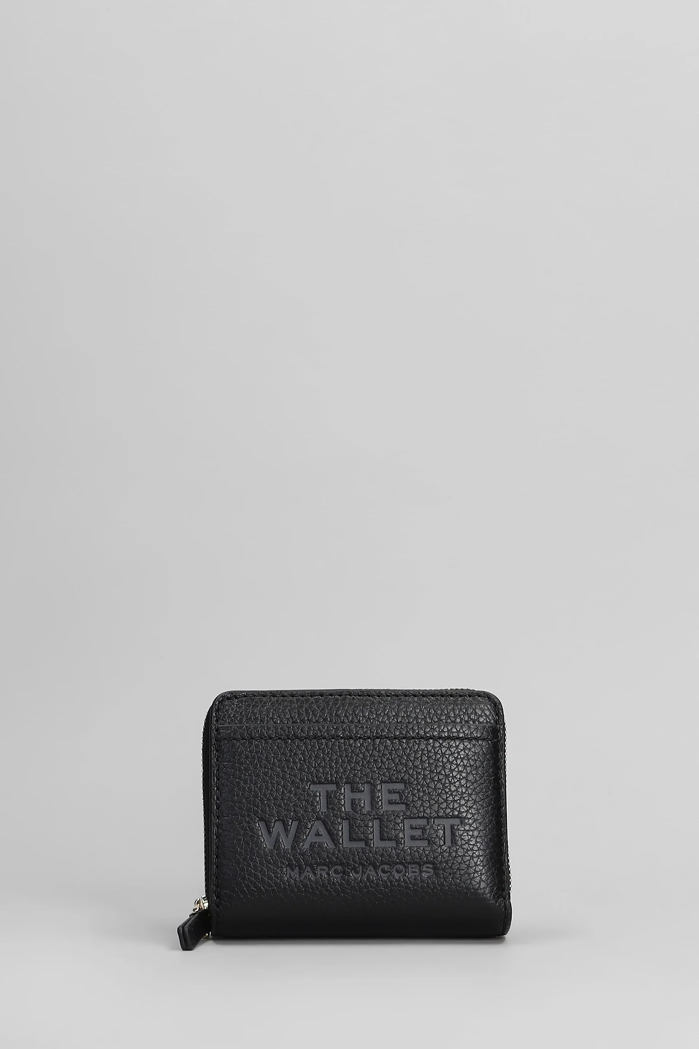 The mini compact Wallet in black leather