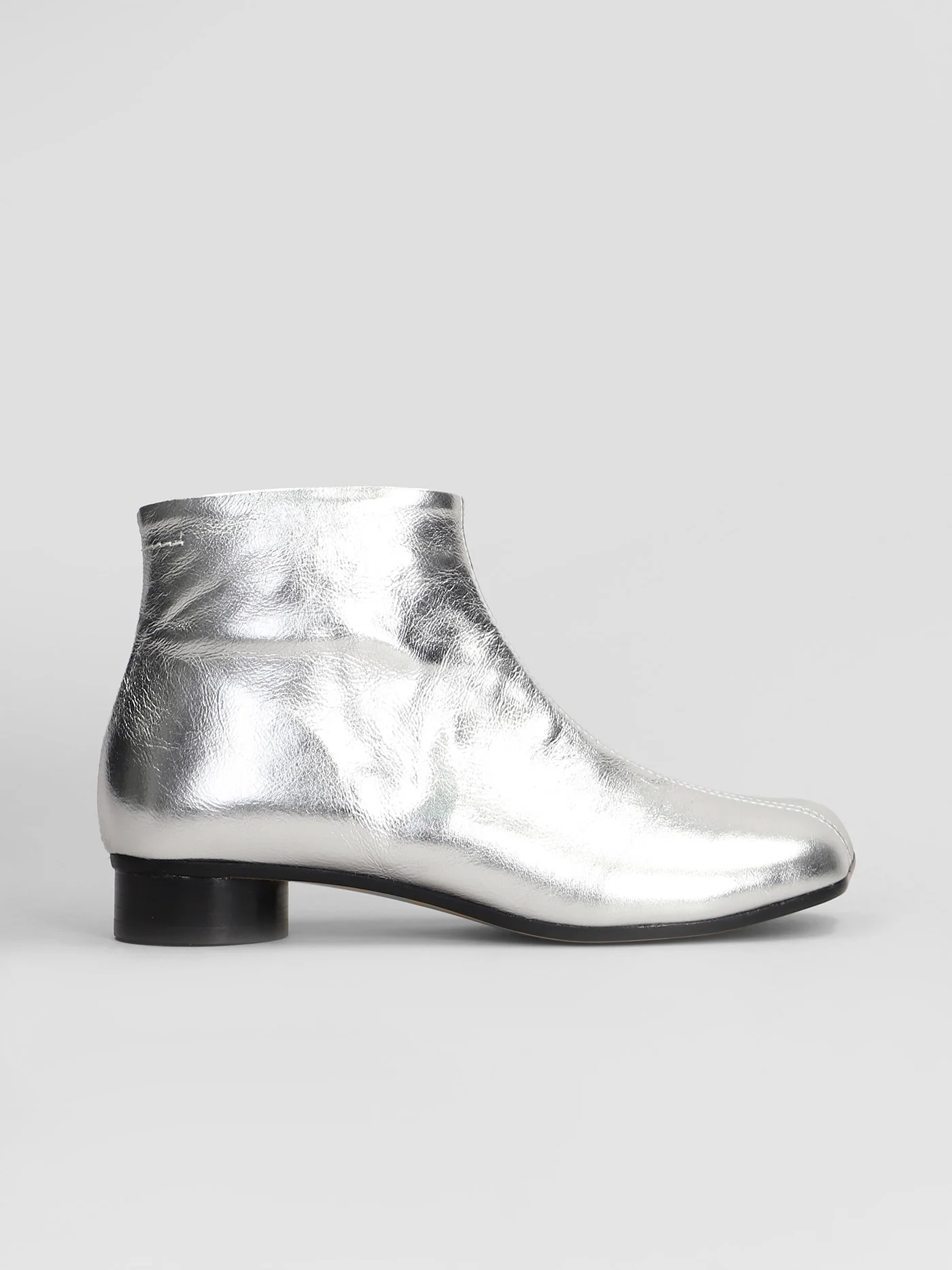 Ankle boots in silver leather