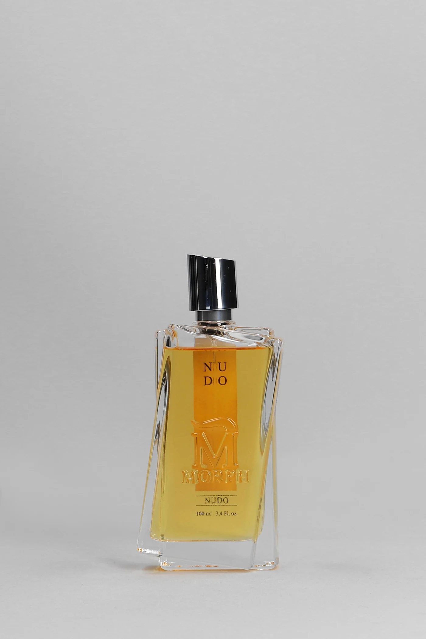 Nudo Perfume in beige glass