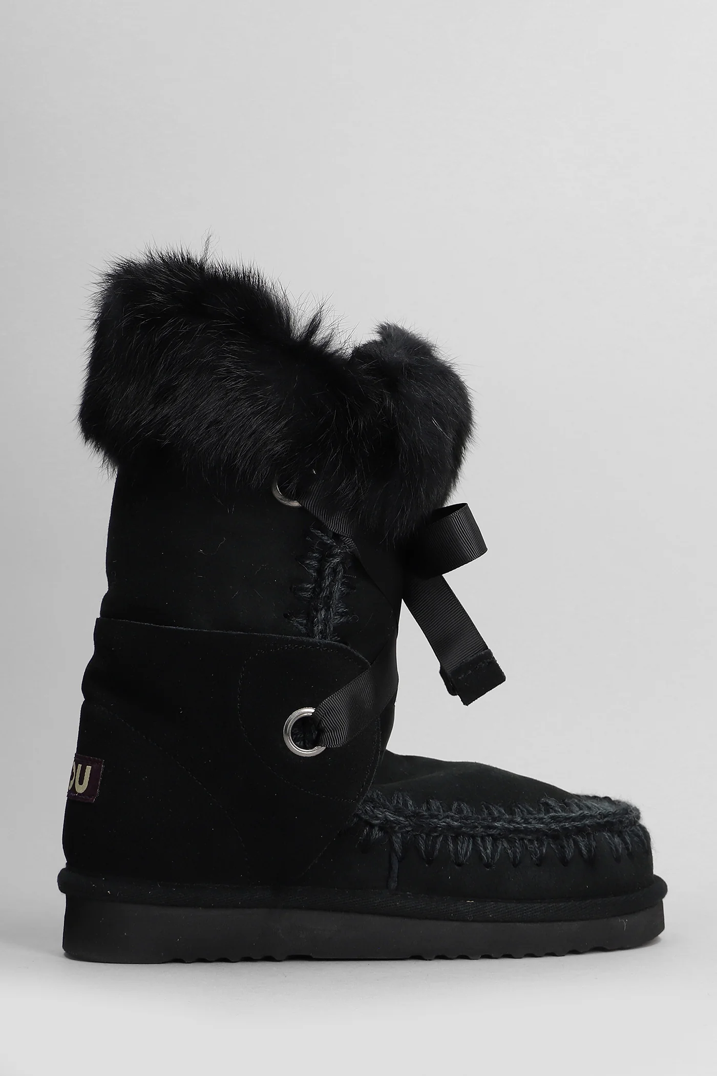 Eskimo lace and fur low heels boots in black suede