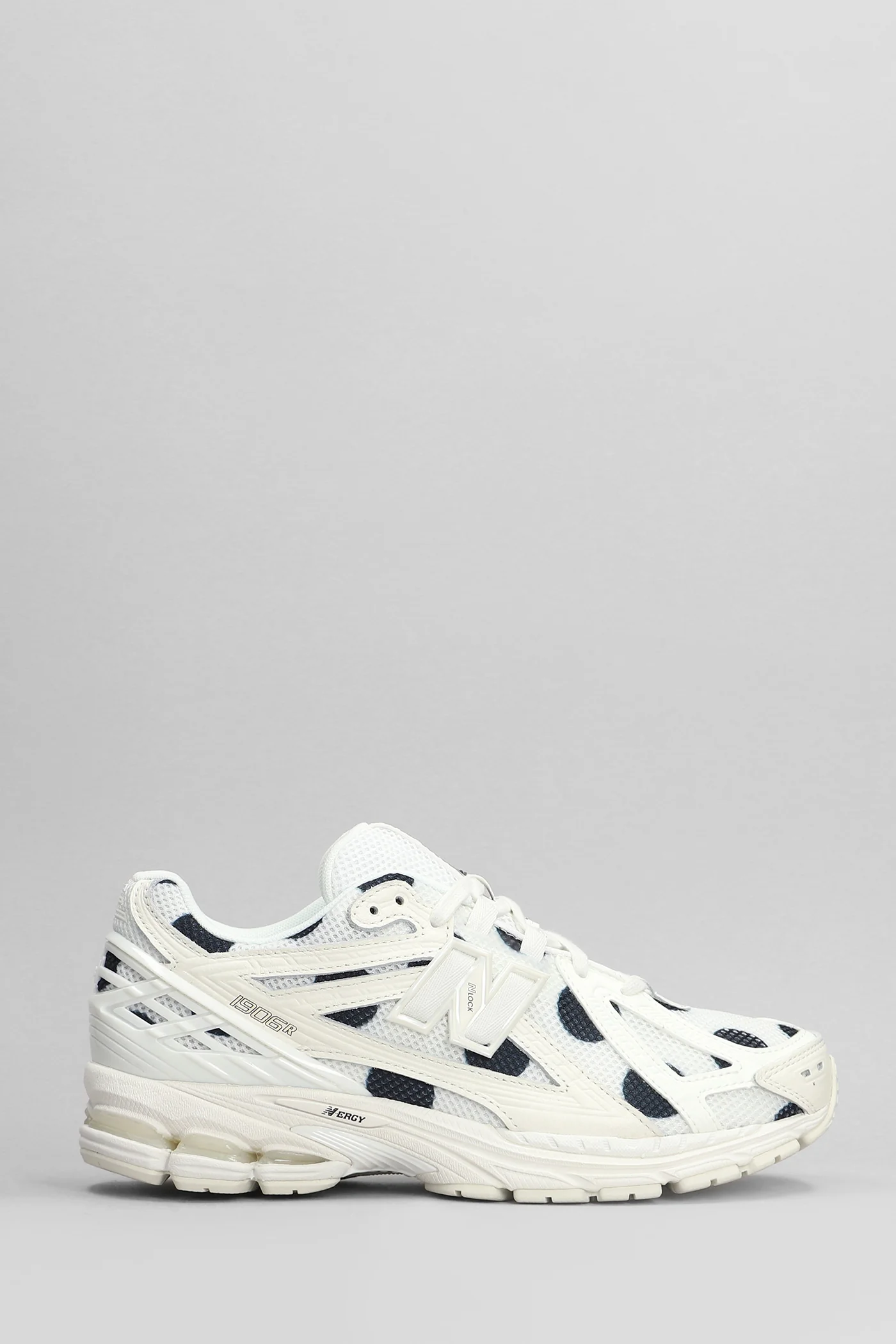 1906R Sneakers in white leather and fabric