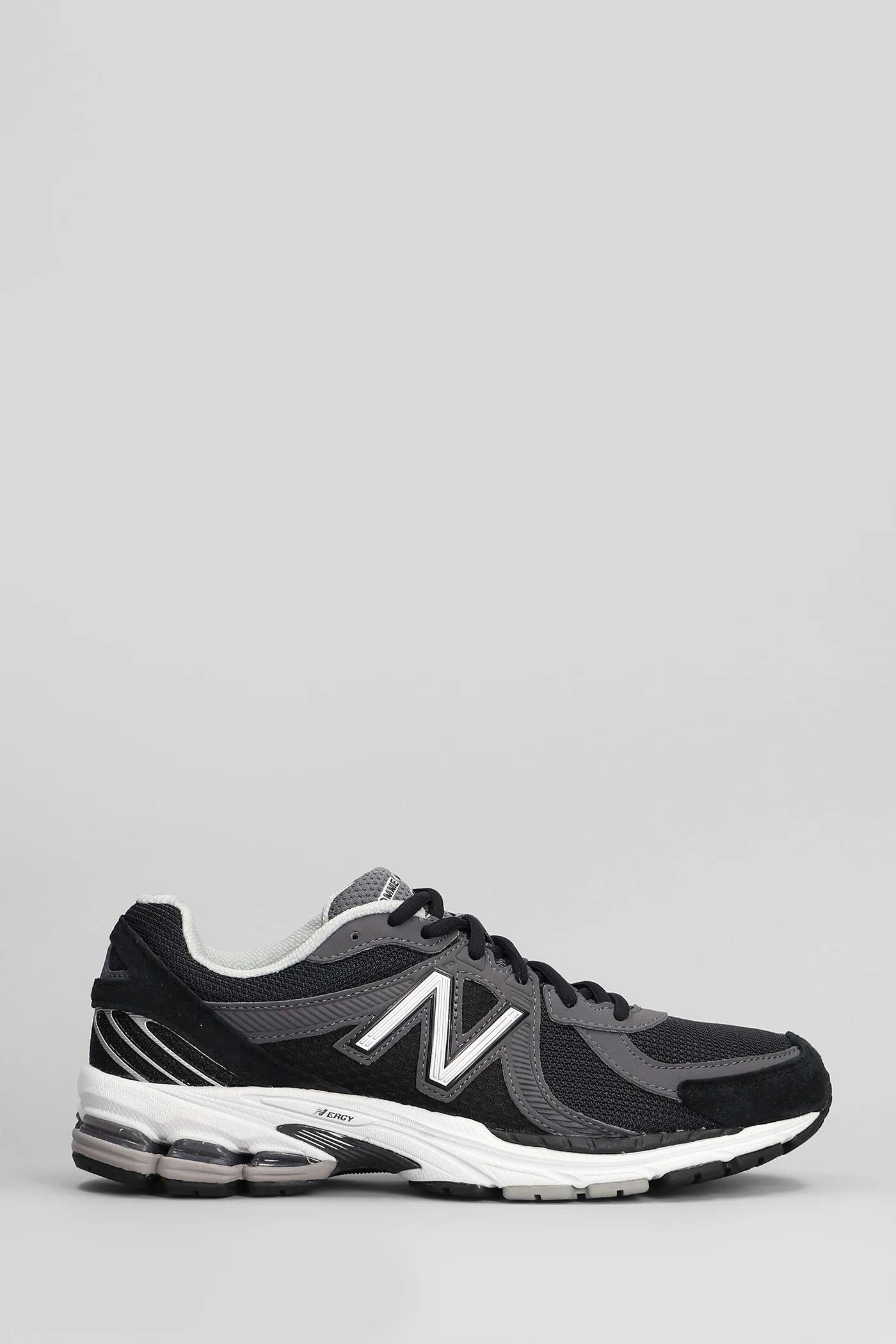 860 Sneakers in black leather and fabric