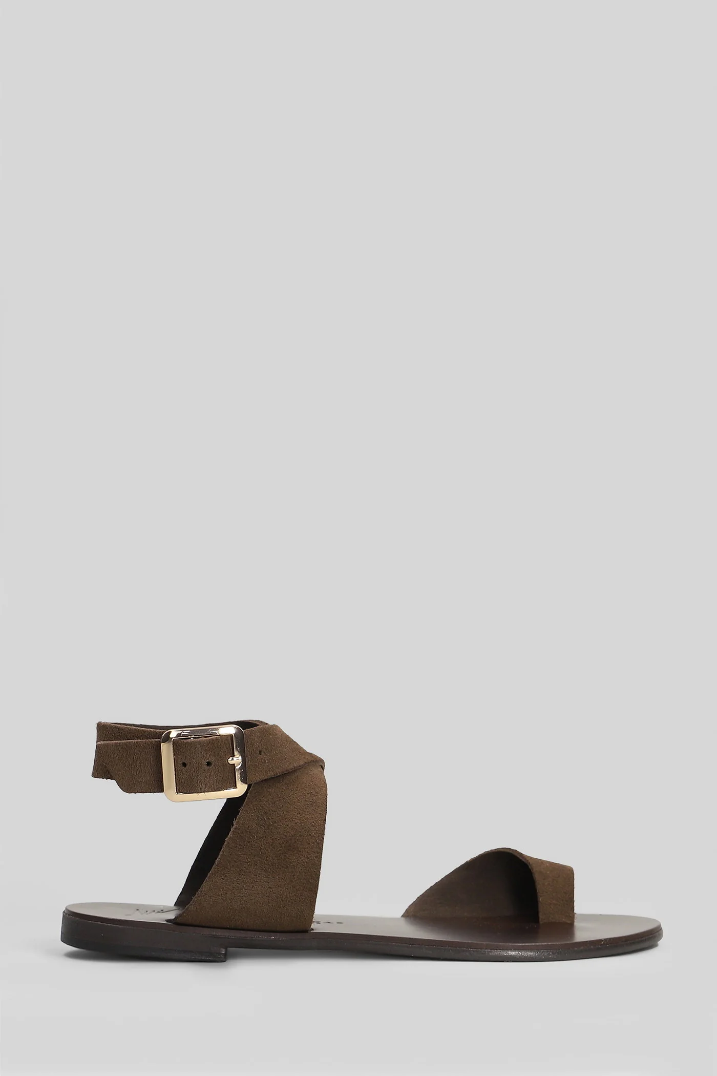 Flat sandal-slipper in brown suede